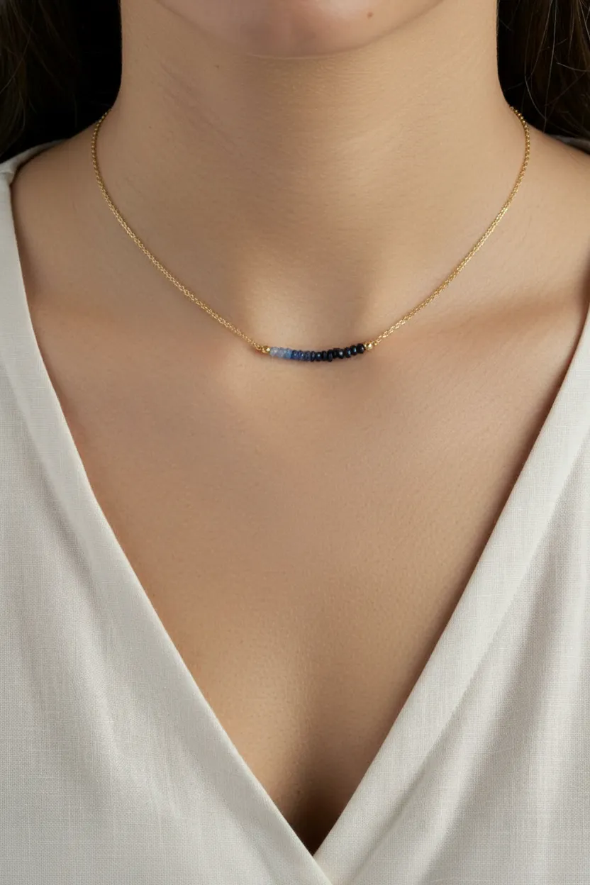 sapphire on neck gold.png