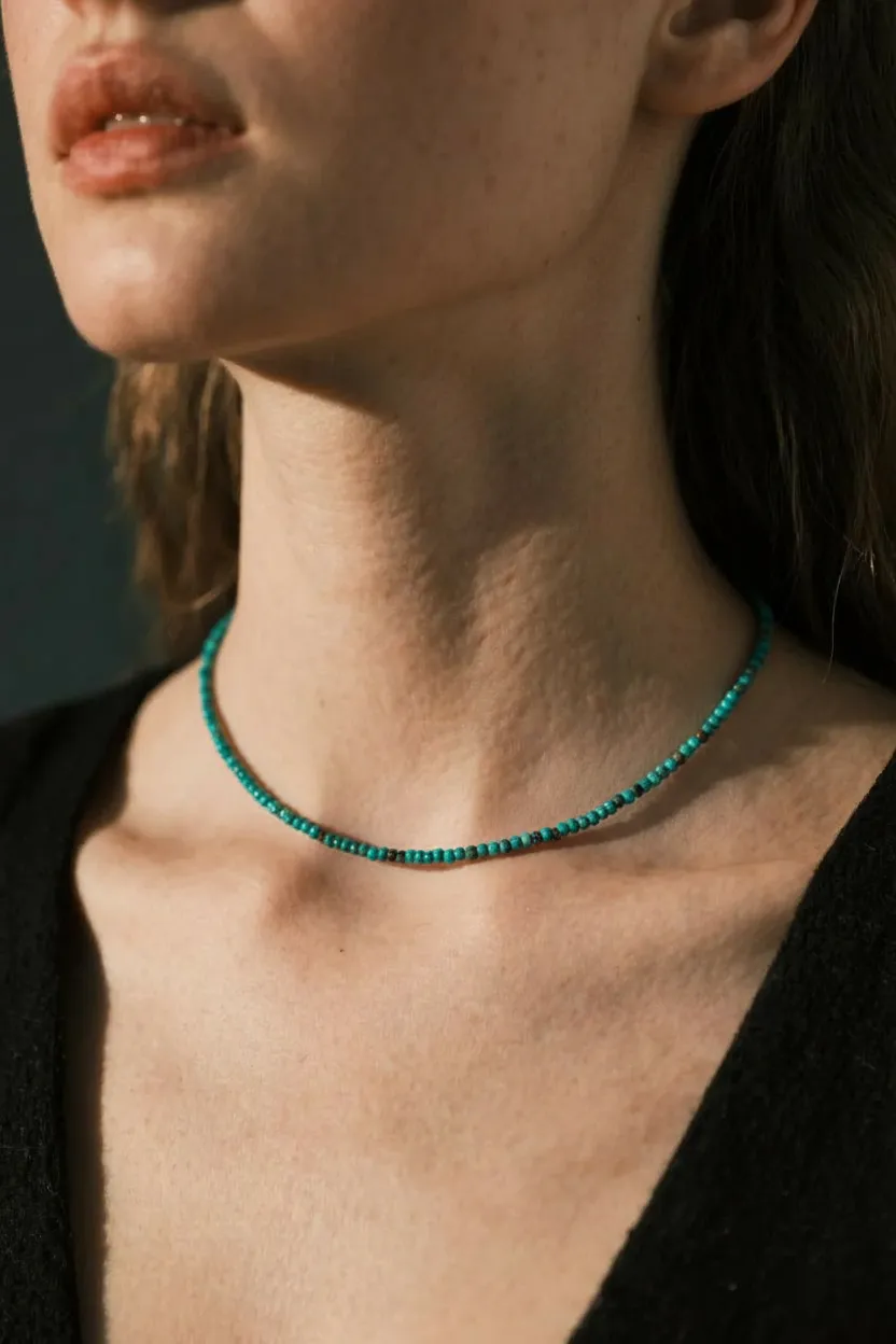 Turqoise Kali on Neck.png