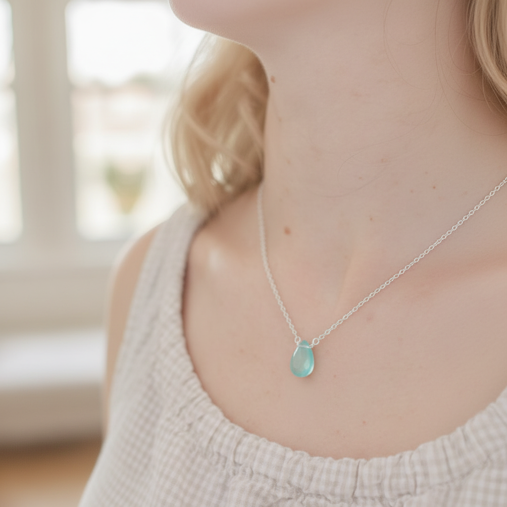 aqua silver on neck.png