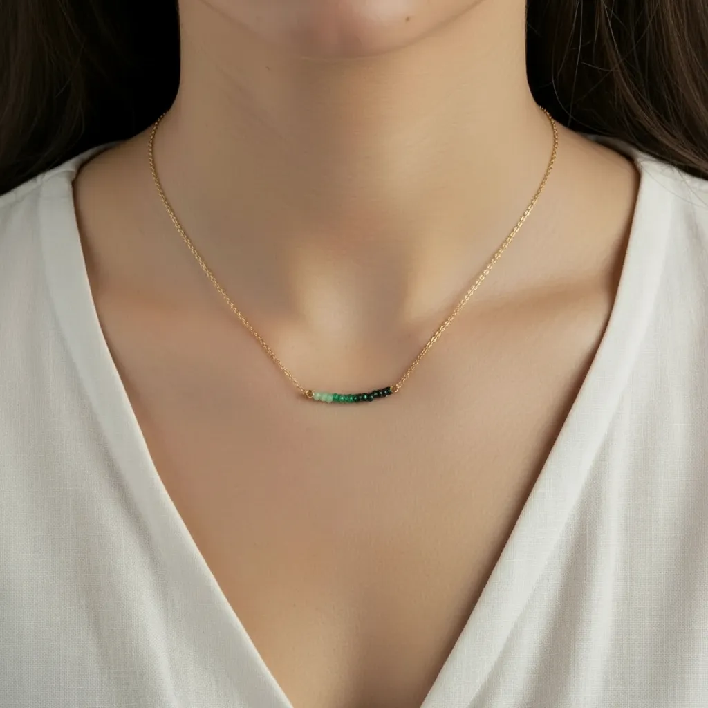 band of emerald on neck gold.png