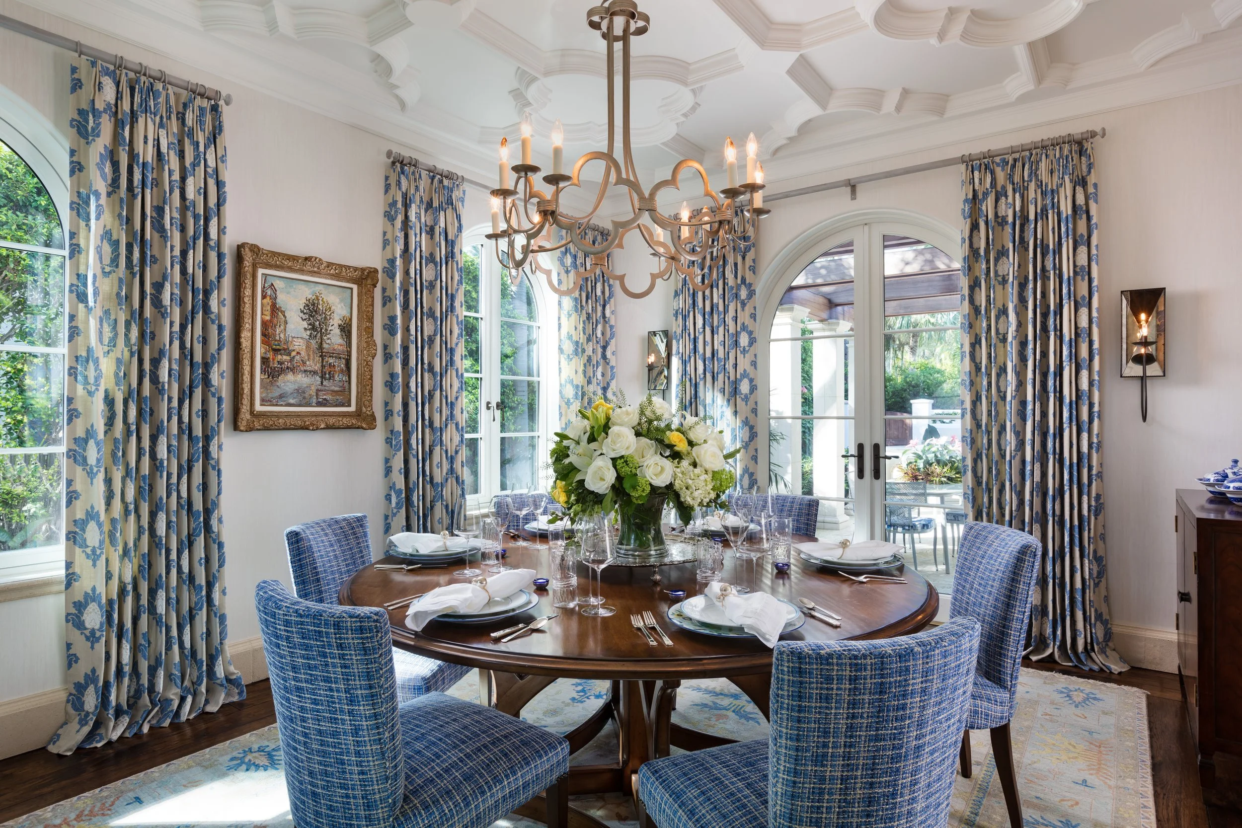 elegant-dining-room-with-round-table-drapery-stately-chandelier-.jpg