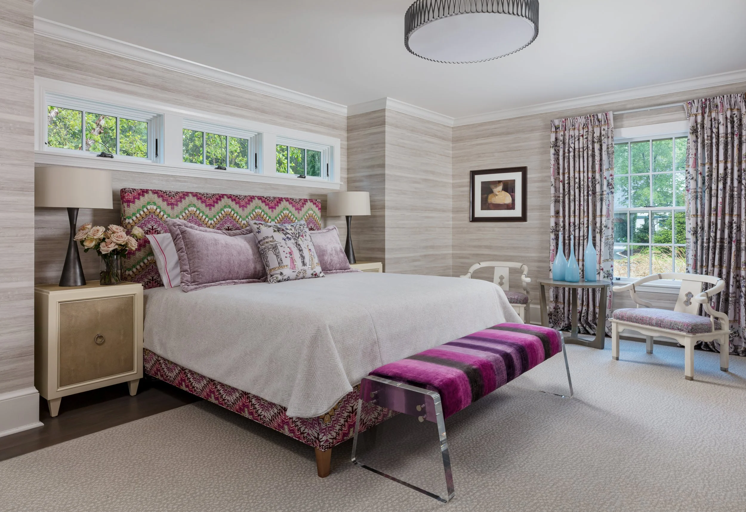 stylish bedroom design with pink patterned headboard white comforter purple bench