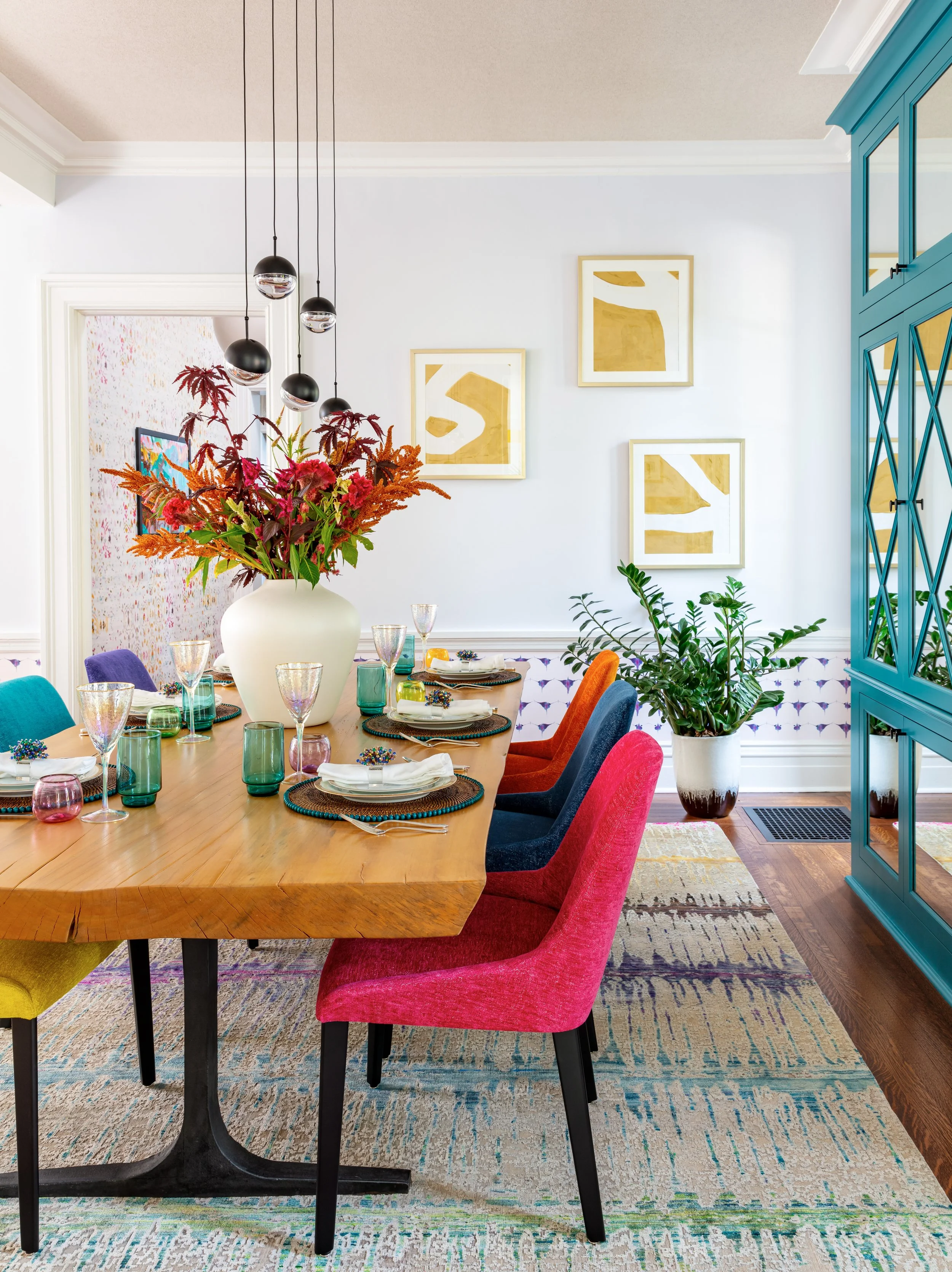 dining-room-live-edge-table-colorful-chairs-modern art-family-gentherings.jpg