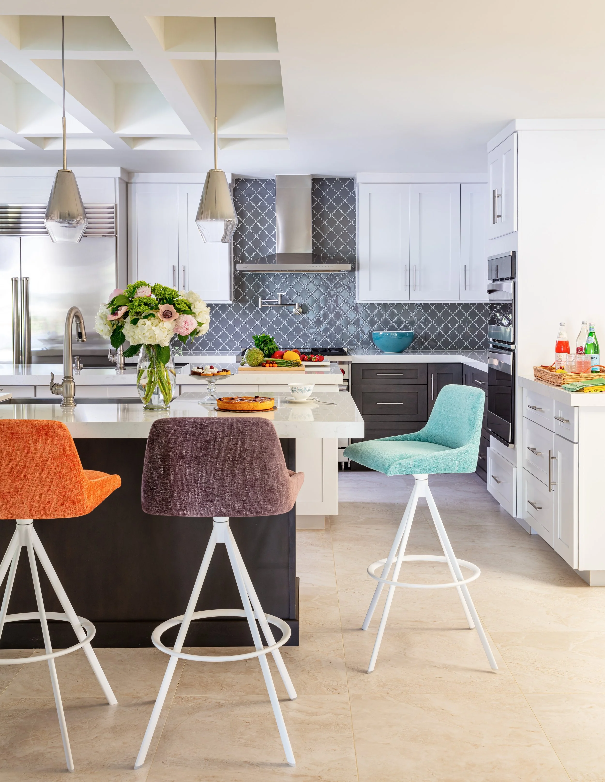 stylish-modern-kitchen-design-with-white-cabinets-gray-back-splash-and-colorful-bar-stools-for-contemporary-home-interior-inspiration.jpg