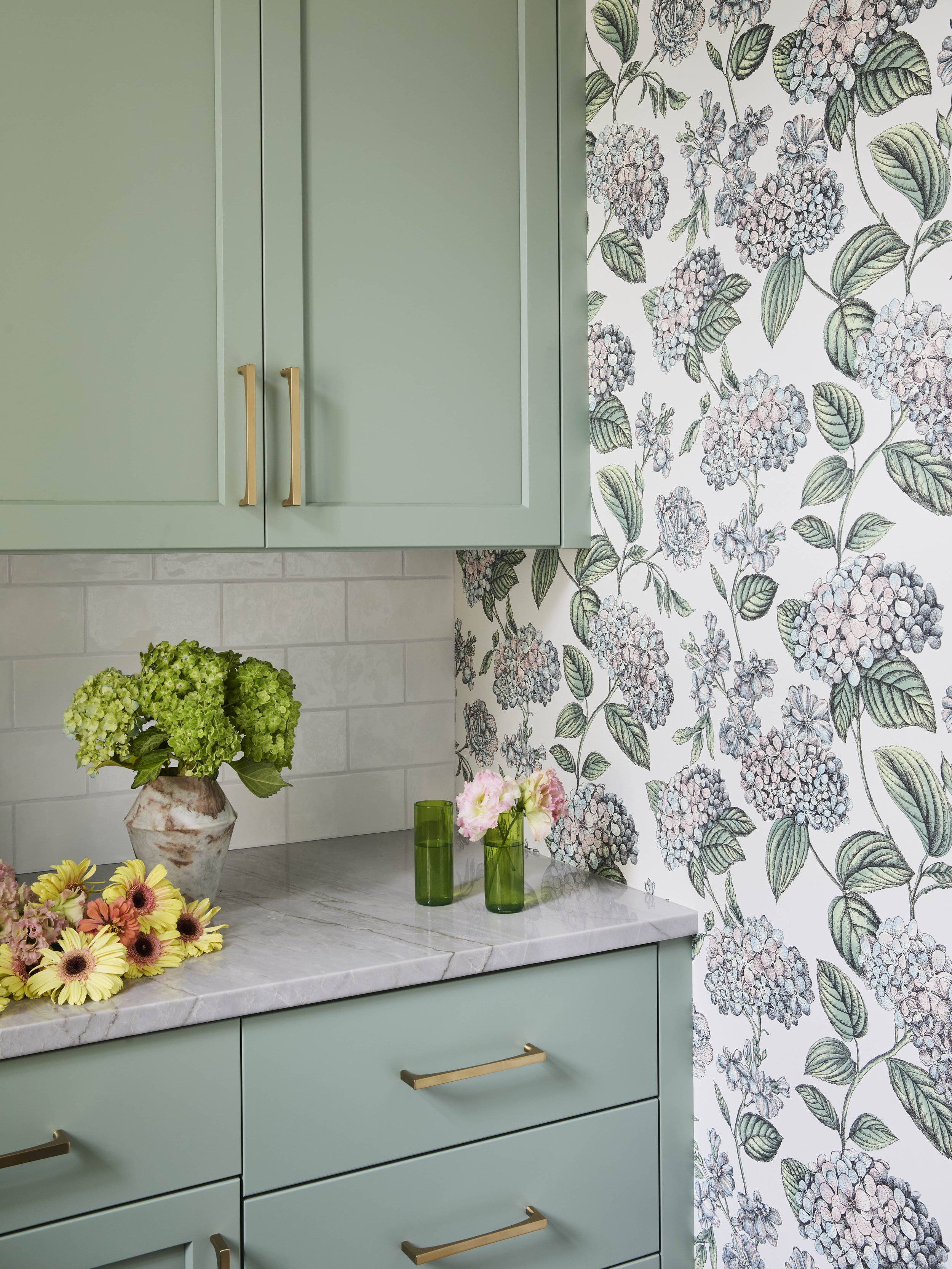 floral-wallpaper-with-painted-cabinets-and-quartz-countertop.jpg