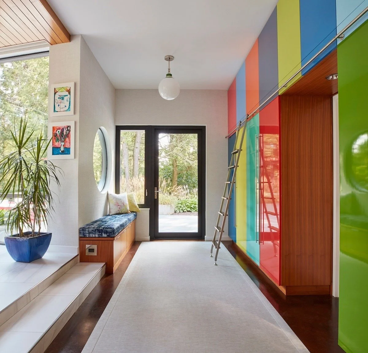 modern-colorful-entryway-hallway-custom-gloss-cabinets-library-ladder-built-in-bench.jpeg