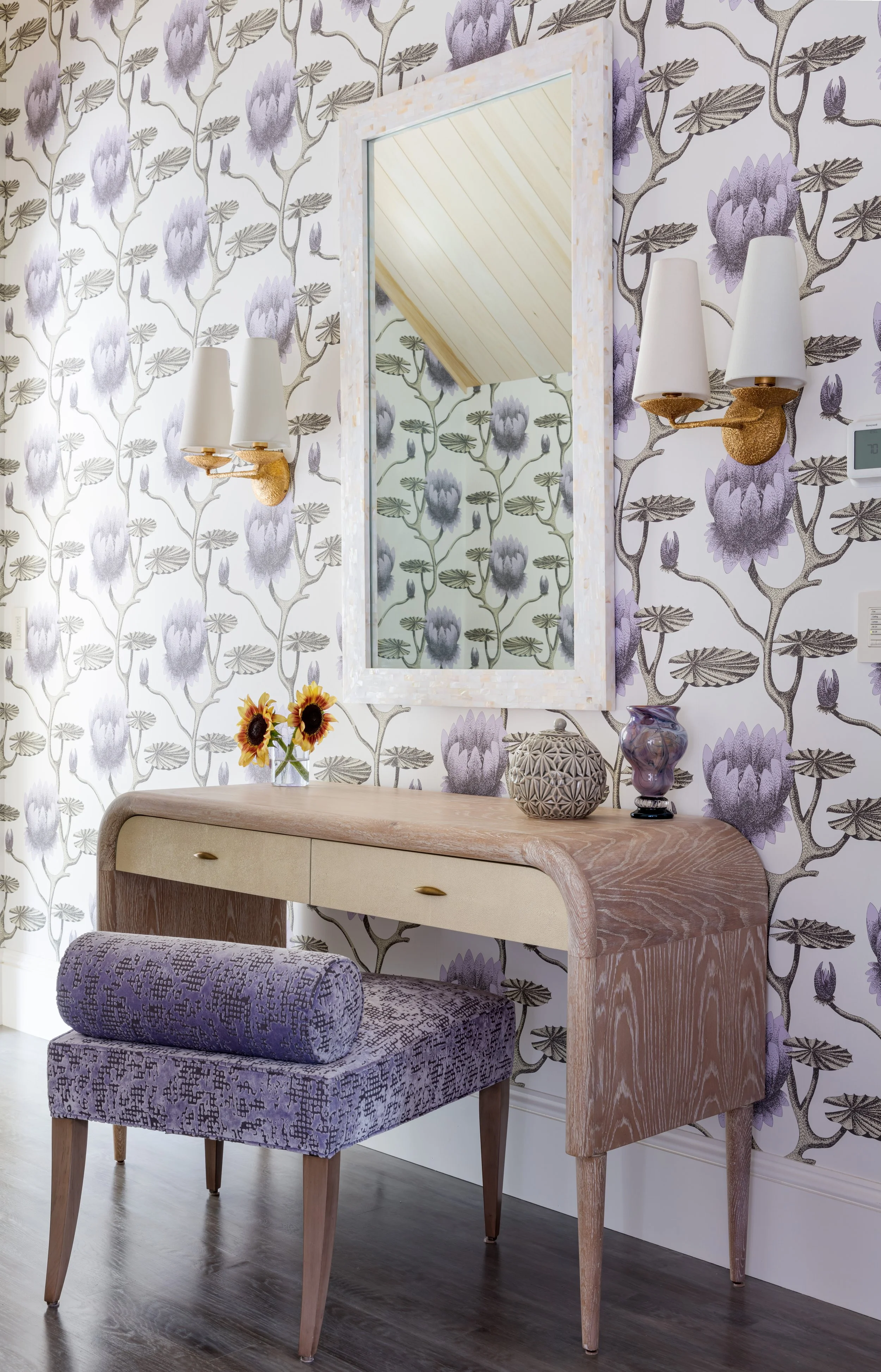 purple-floral-writing-nook-with-vanity-table-and-stool-lavender-tufted-seat-brass-sconces-luxury-interior-design-inspiration.jpg