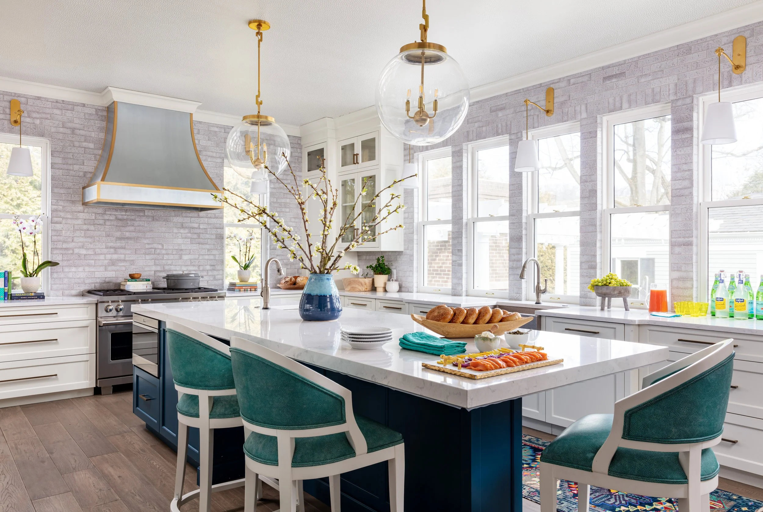 kitchen design ideas contemporary style white cabinetry hardwood floors pendant lighting island counter seating