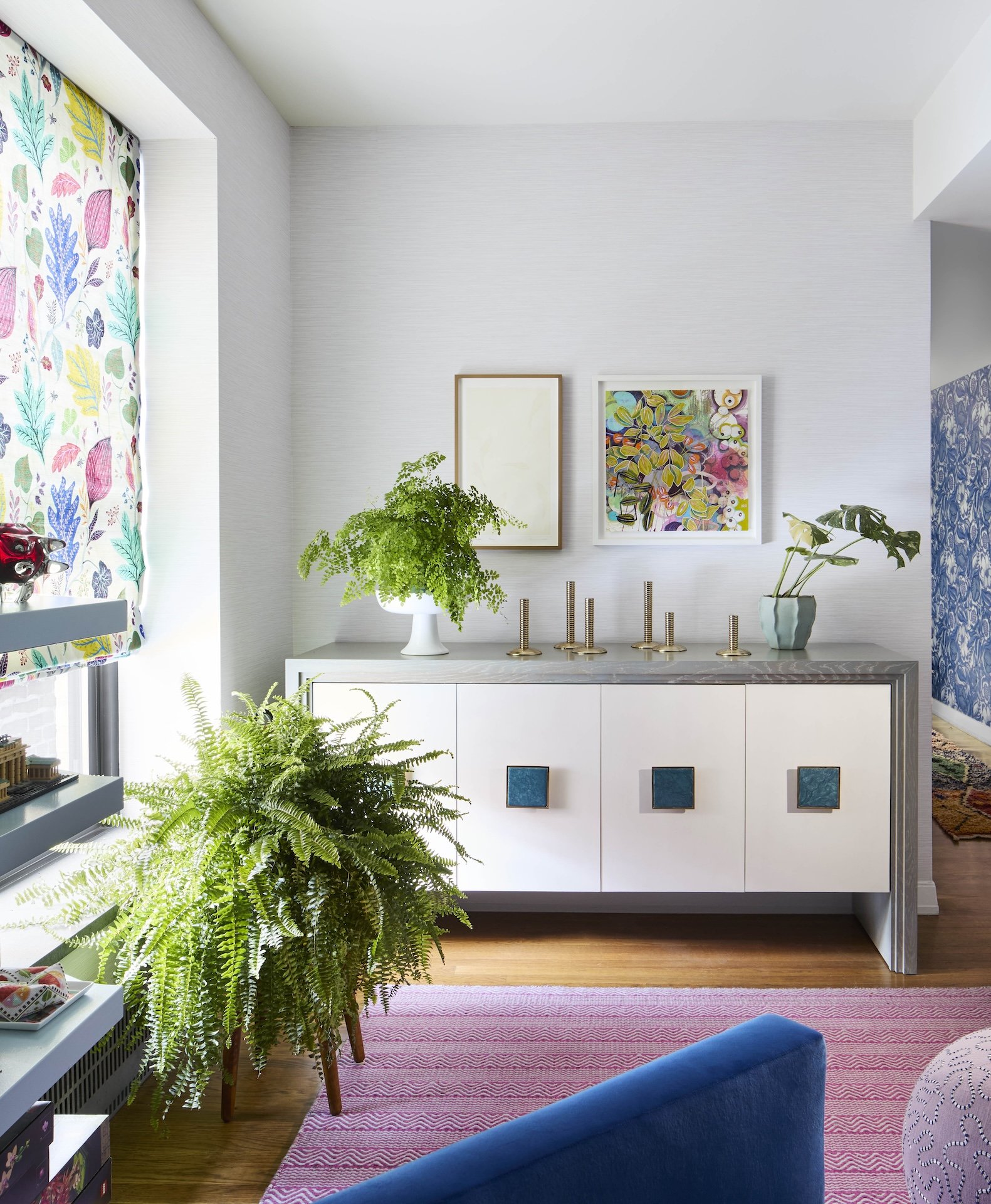 Modern living room with sleek console minimalist decor and natural light creating a serene space for comfort