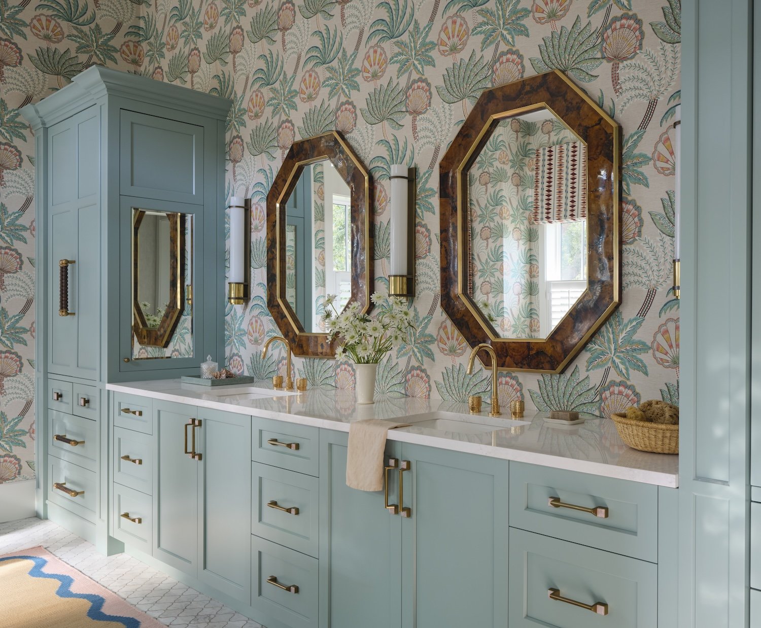 tropical-bathroom-vanity-sage-green-cabinets-octagon-mirrors-floral-wallpaper-brass-fixtures-design.jpg