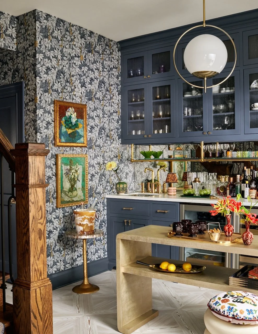 curated pantry leaf wallpaper blue cabinets