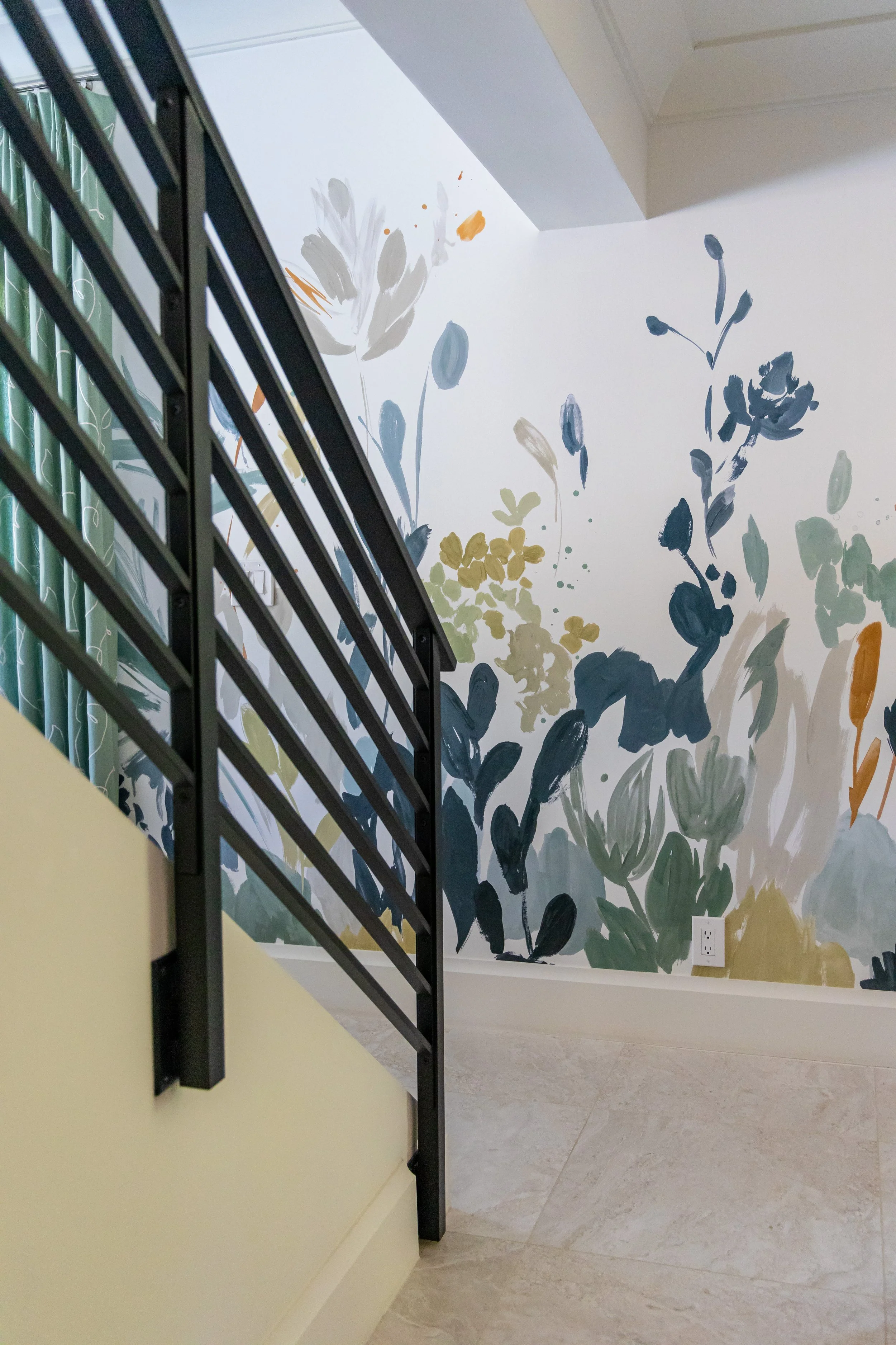 design-details-mural-for-family-room-plant-inspired-iron-stair-banisters.jpg