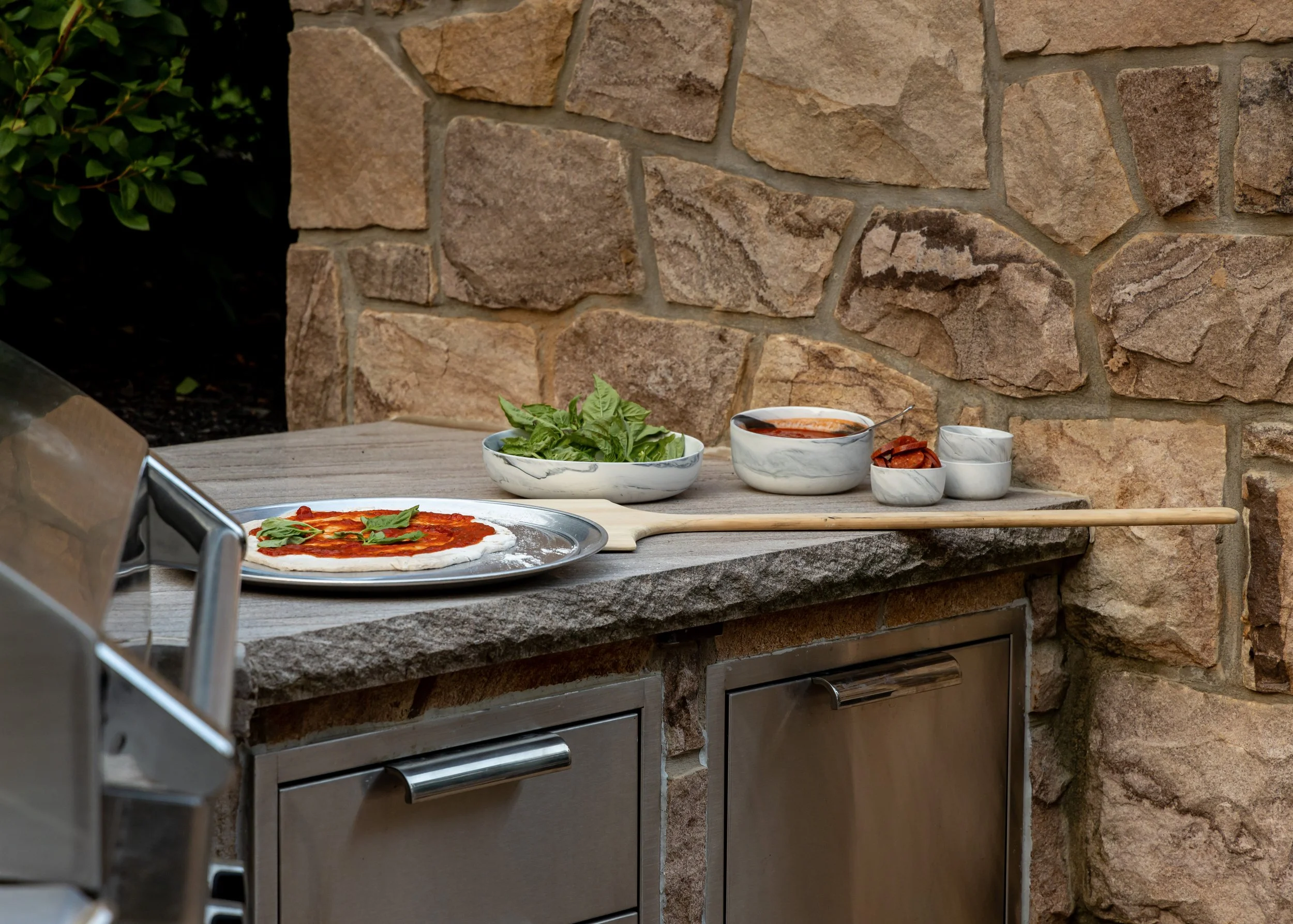 outdoor-pizza-oven-alfresco-diniing-historic-home-renovation.jpg