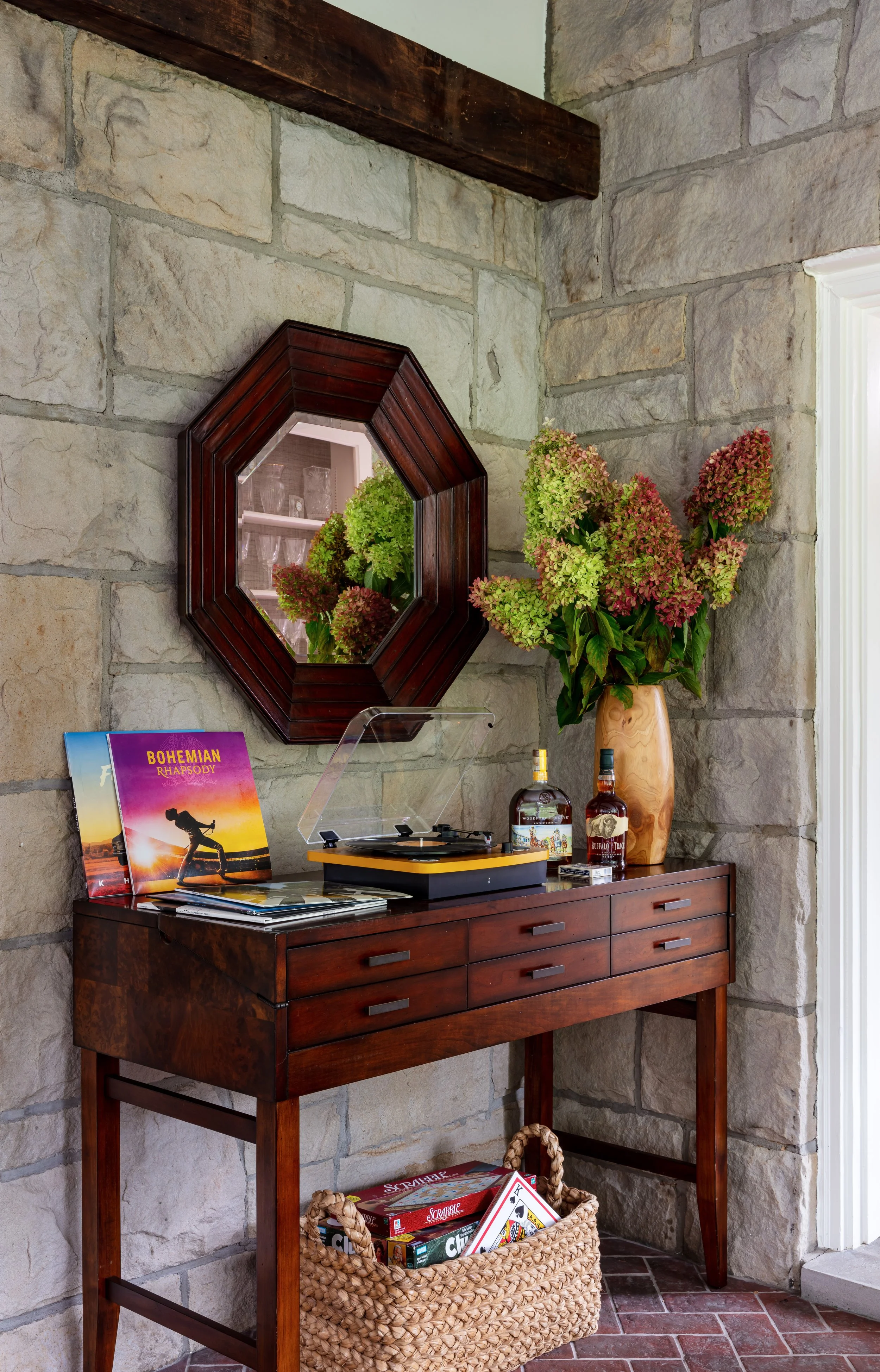 farmhouse inspired entryway console table with vinyl record player mirror flowers rustic decor design