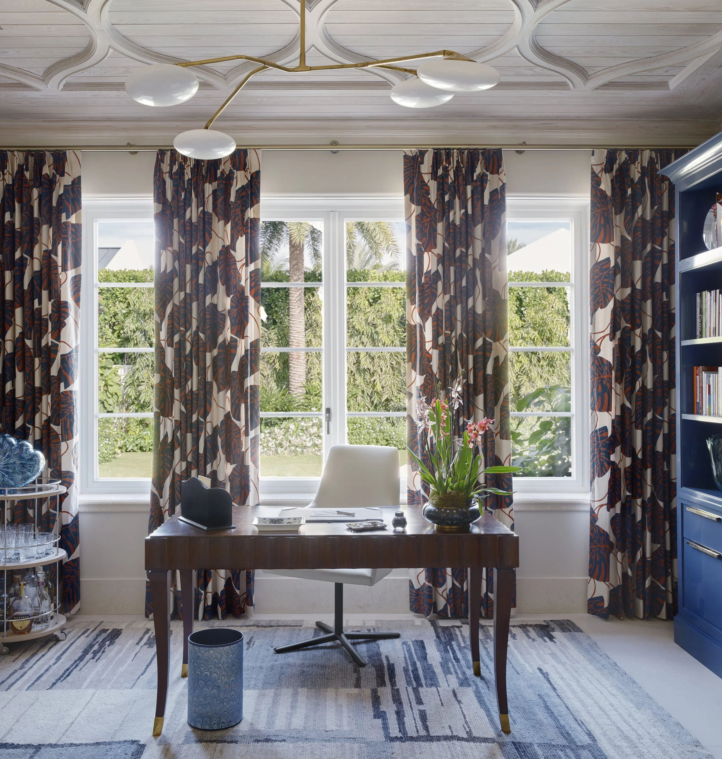 home office design with patterned curtains modern desk blue bookshelf luxury interior decoration inspirational workspace