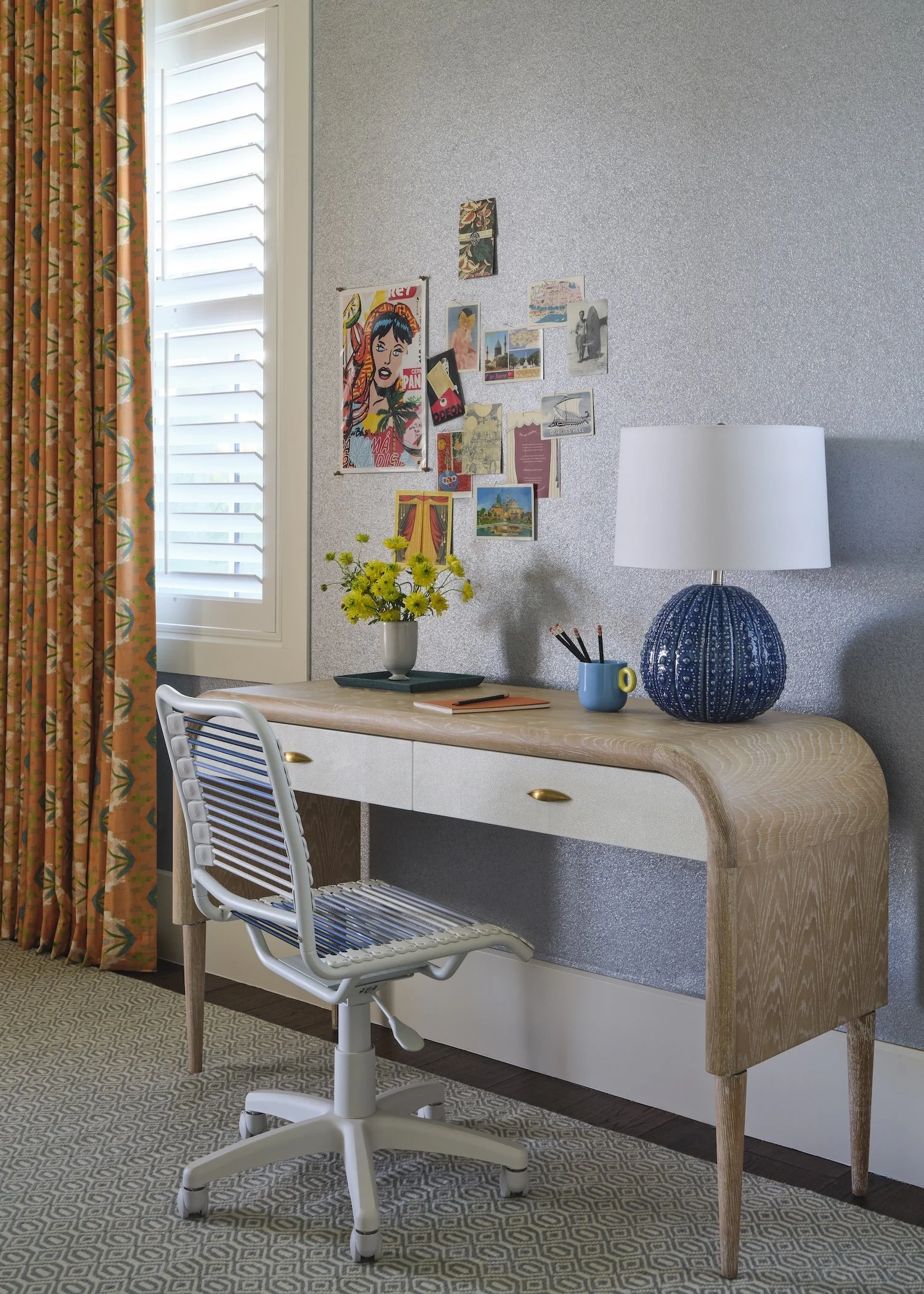 37-bedroom-glitter-wallpaper-curved-desk-white-chair-blue-lamp-colorful-drapes-functional-design.jpg