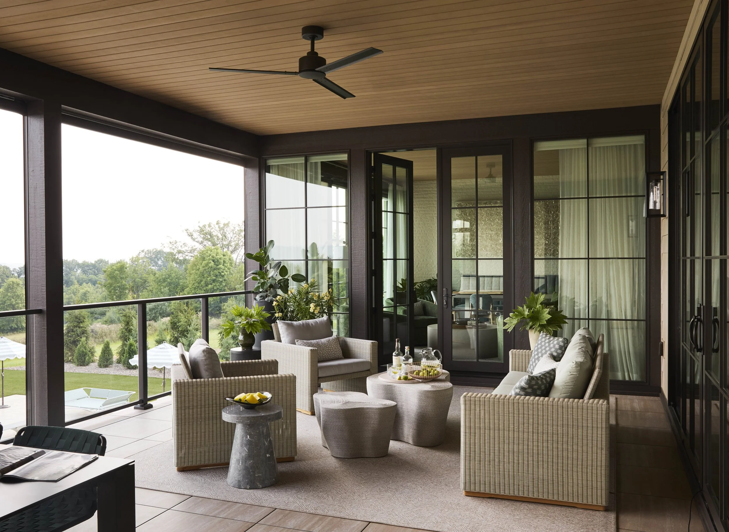covered-patio-with-large windows-and-outdoor-furniture.jpg