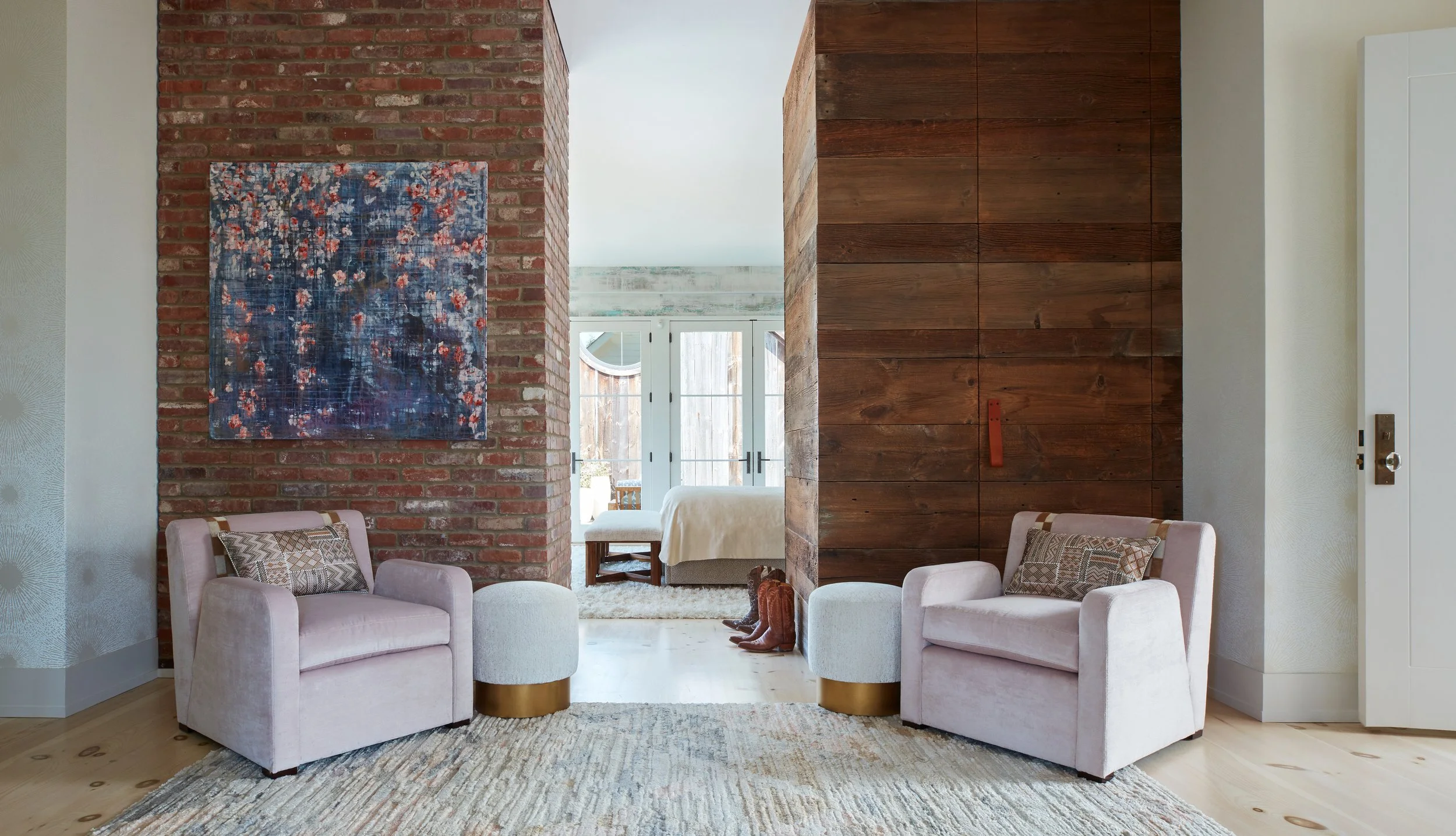 industrial-chic-living-space-with-exposed-brick-and-reclaimed-wood-accent-wall-featuring-pink-velvet-armchairs-and-gold-accented-side-tables-inspired-by-modern-interior-design-trends-for-elegant-home-decor-and-stylish-room-inspiration.jpg