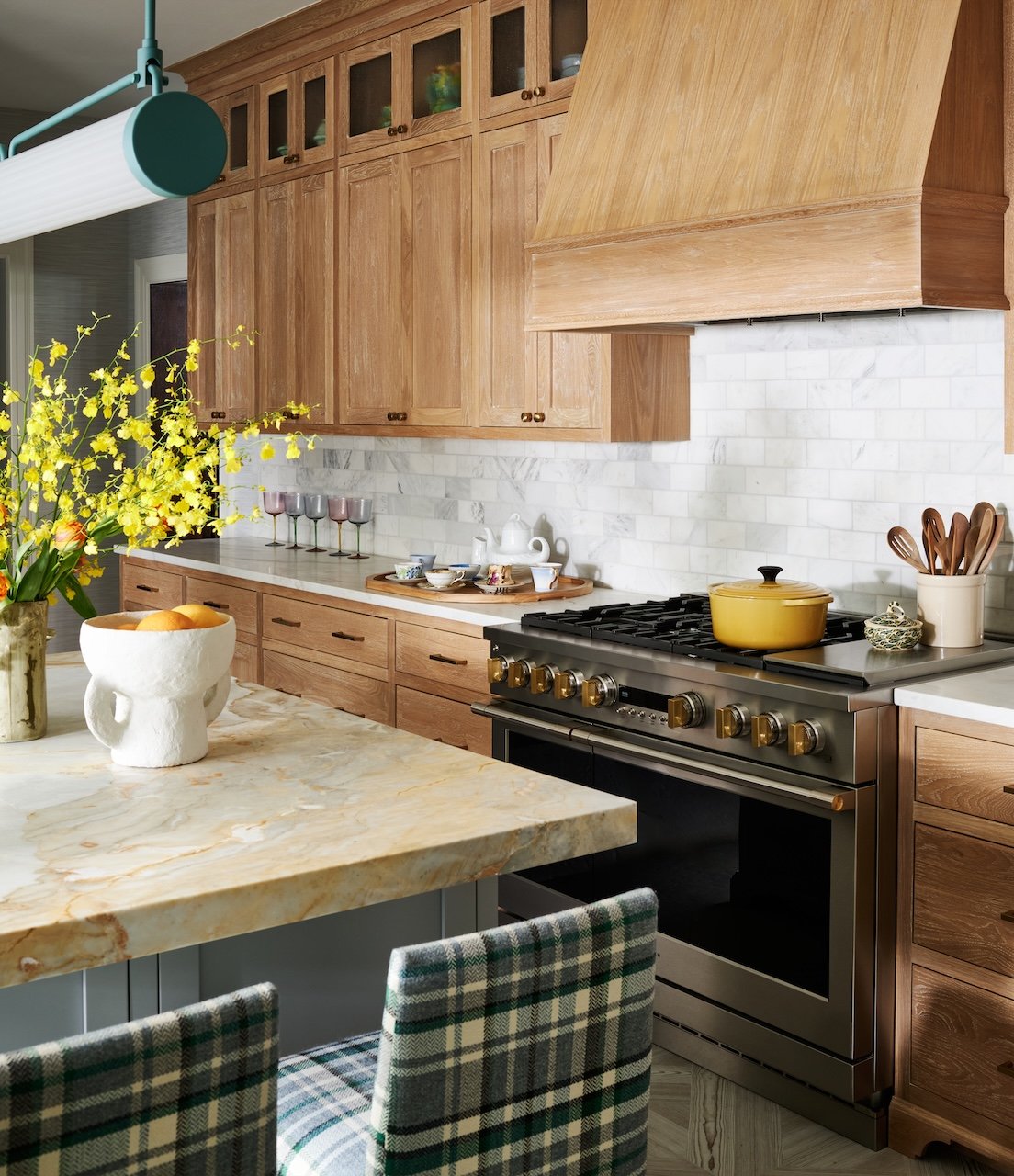 Warm oak kitchen marble backsplash custom wood hood