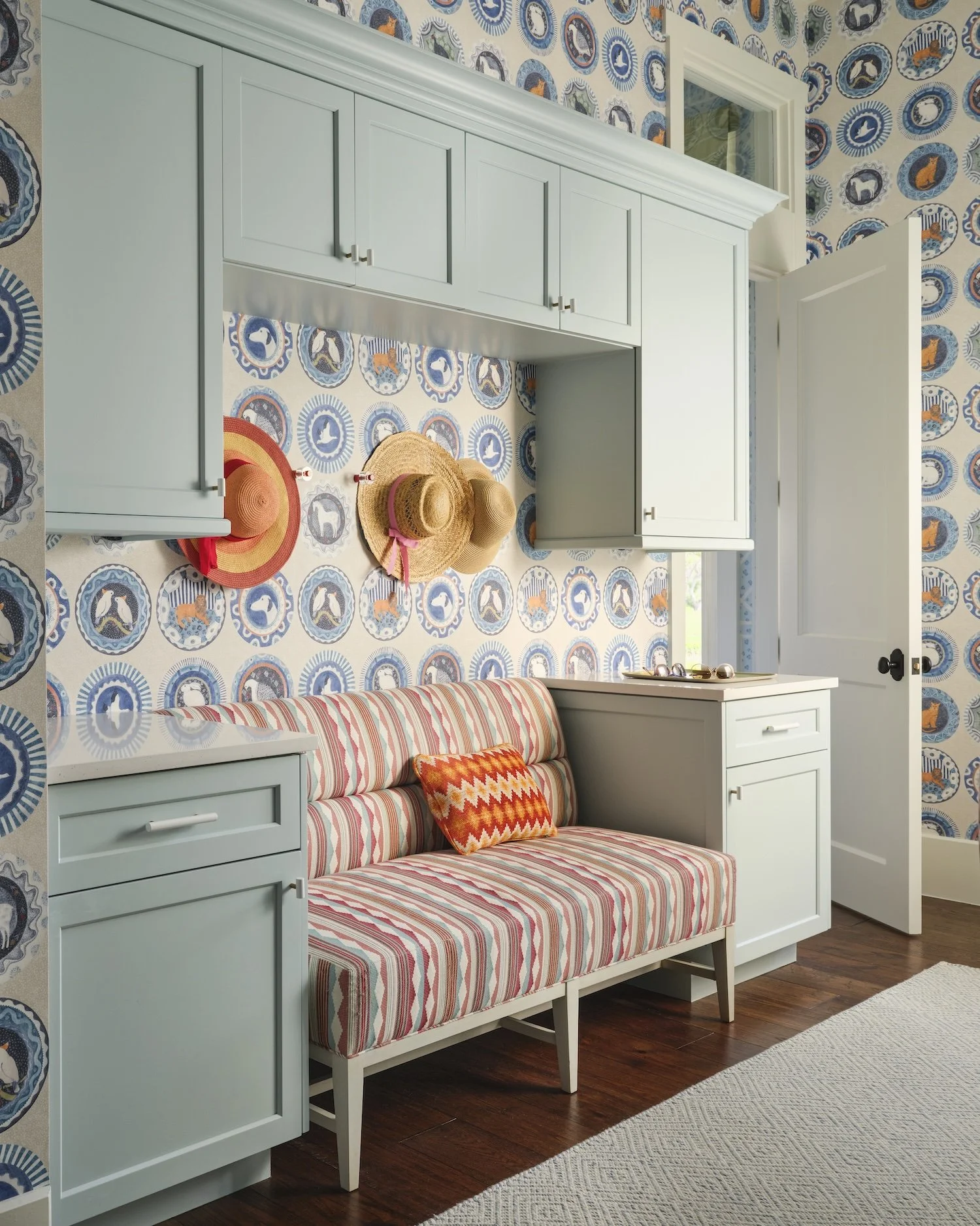 41-patterned-wallpaper-mudroom-light-blue-cabinets-striped-bench-sun-hats-storage-entryway-designjpg.jpg