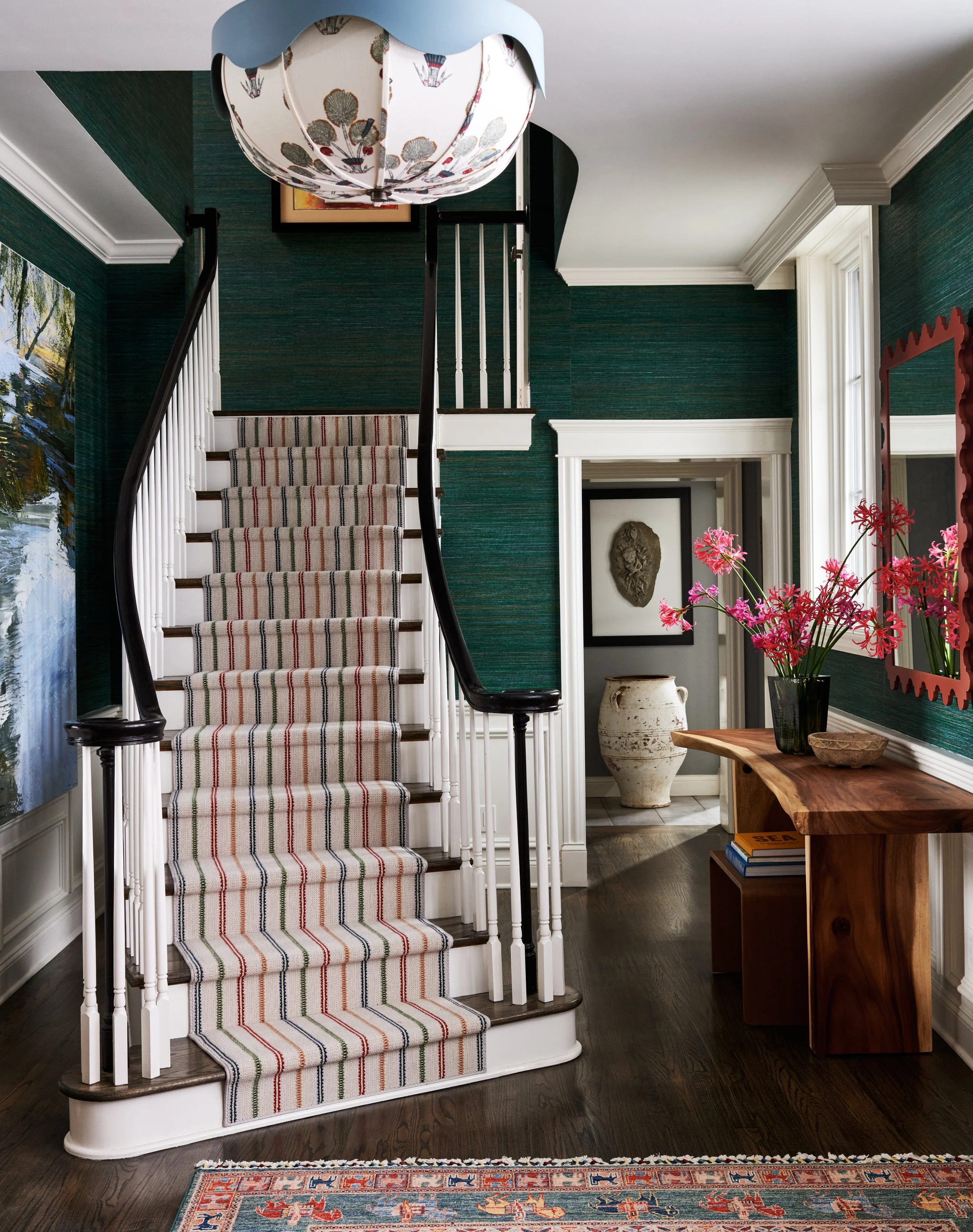 Striped stair runner with bold and warm color tones. 