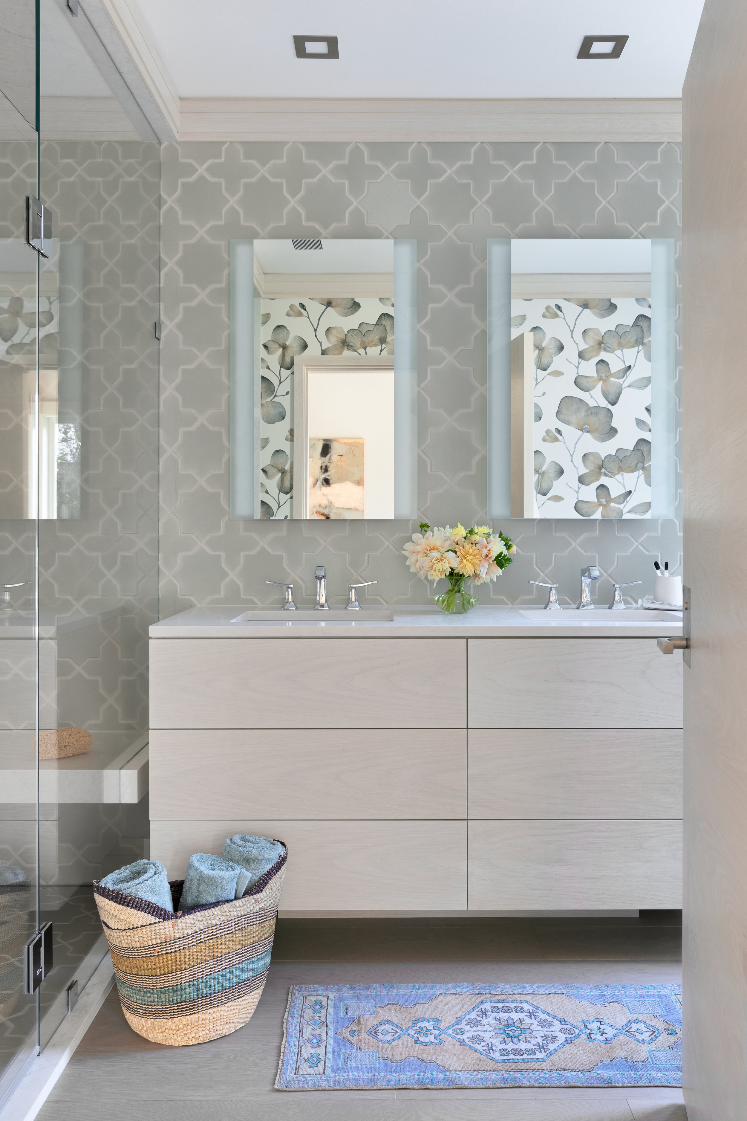 light and airy neutral bathroom with double sink and mirrors