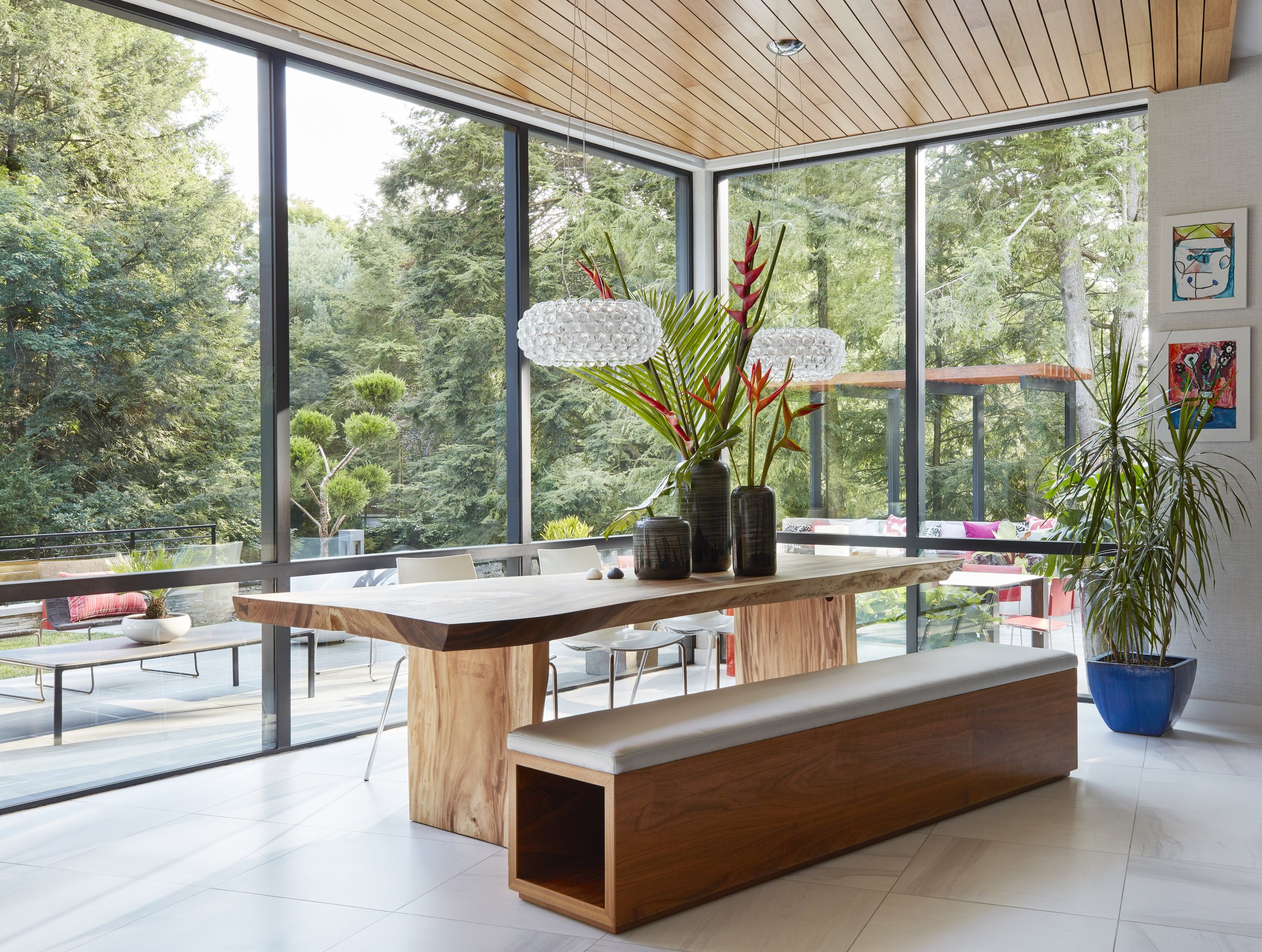 live edge dining table with bench seat for modern kitchen with floor to ceiling windows