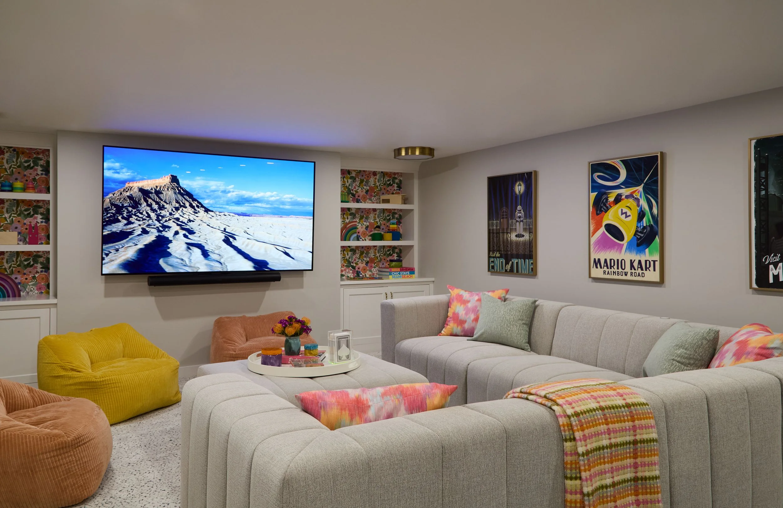 cozy-game-room-design-with-large-sectional-and-swivel-chairs.jpg