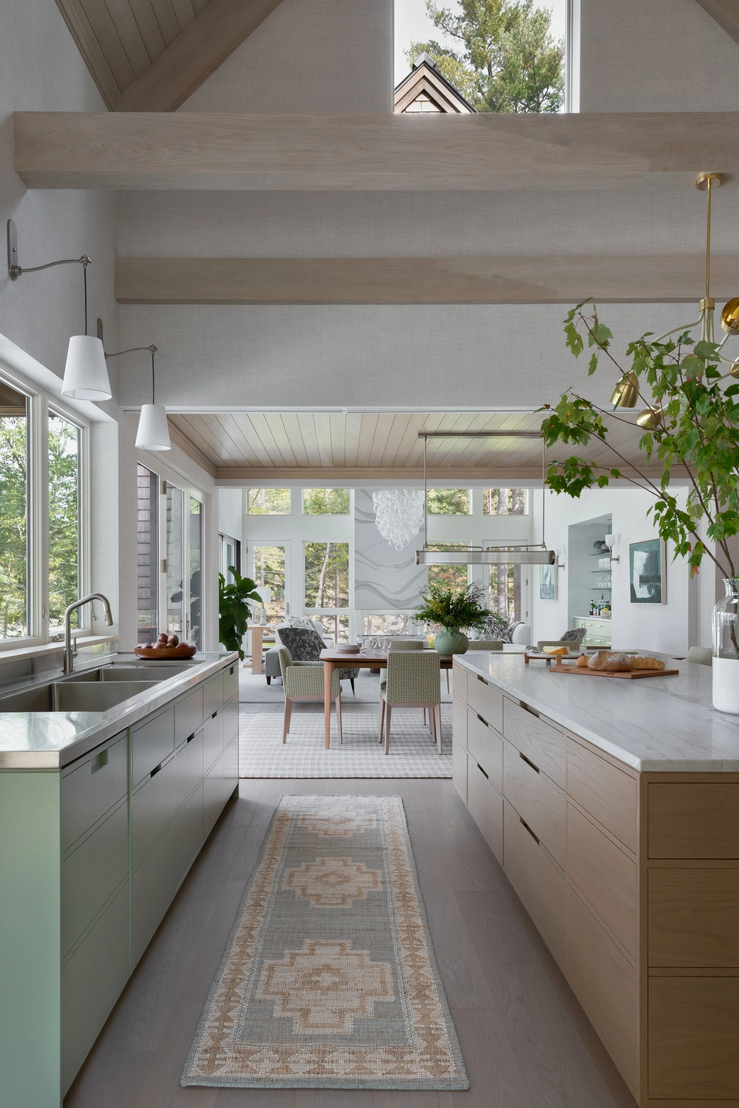 open concept kitchen with large island and dining room for modern living