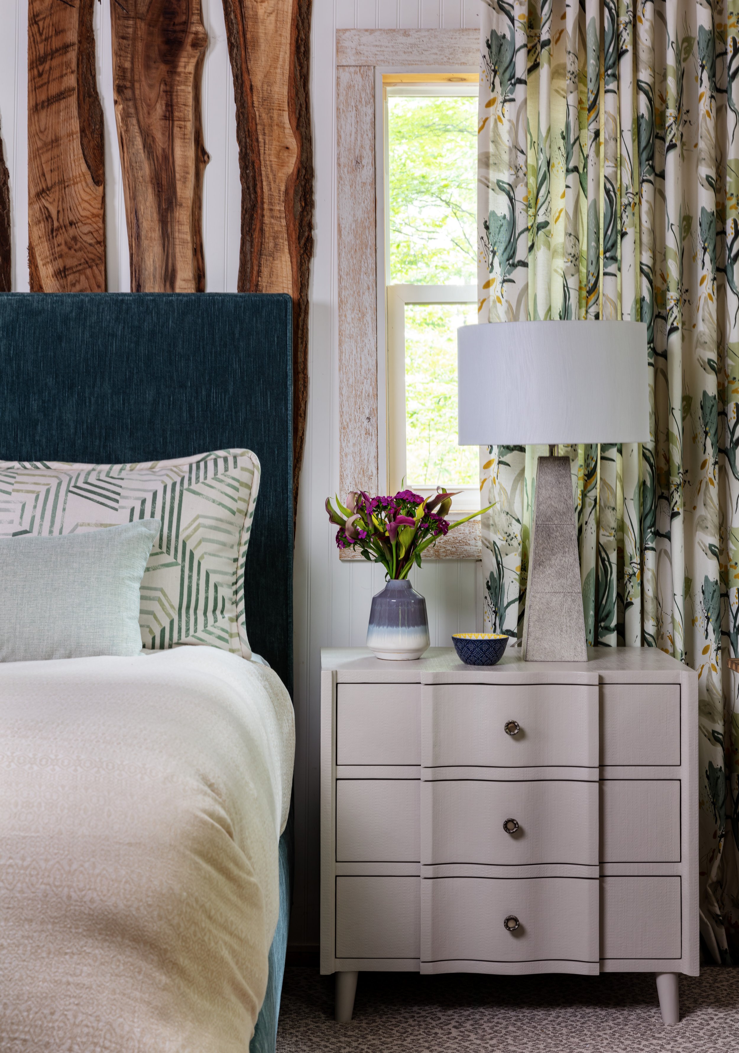 cozy-bedroom-design-with-teal-headboard-white-dresser.jpg