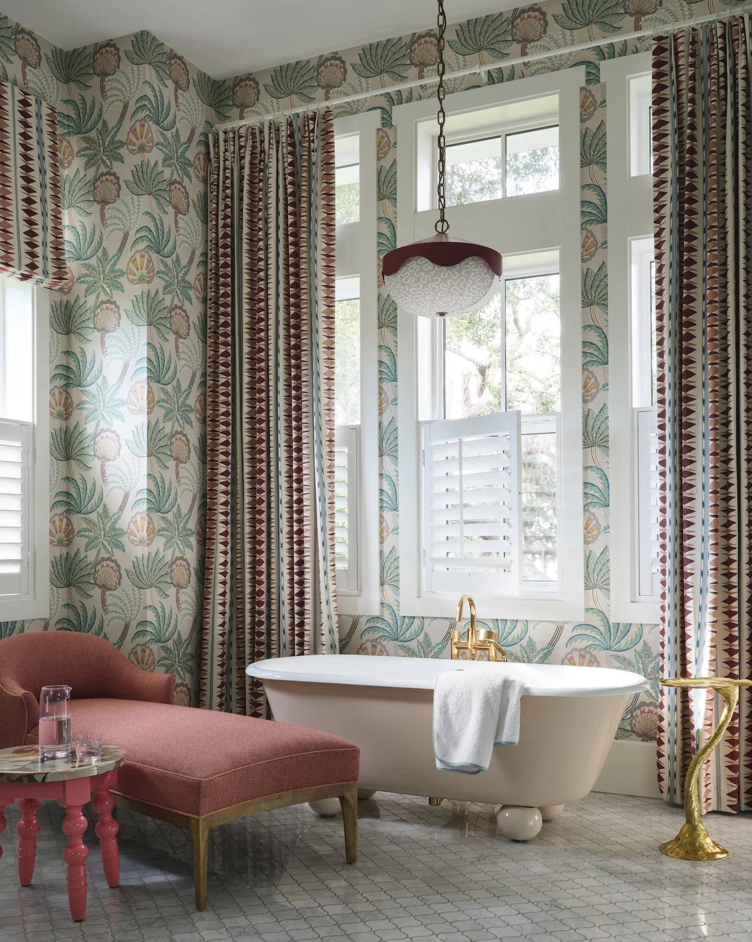 29-tropical-bathroom-clawfoot-tub-pink-chaise-lounge-patterned-wallpaper-curtains-unique-lighting-design.jpg