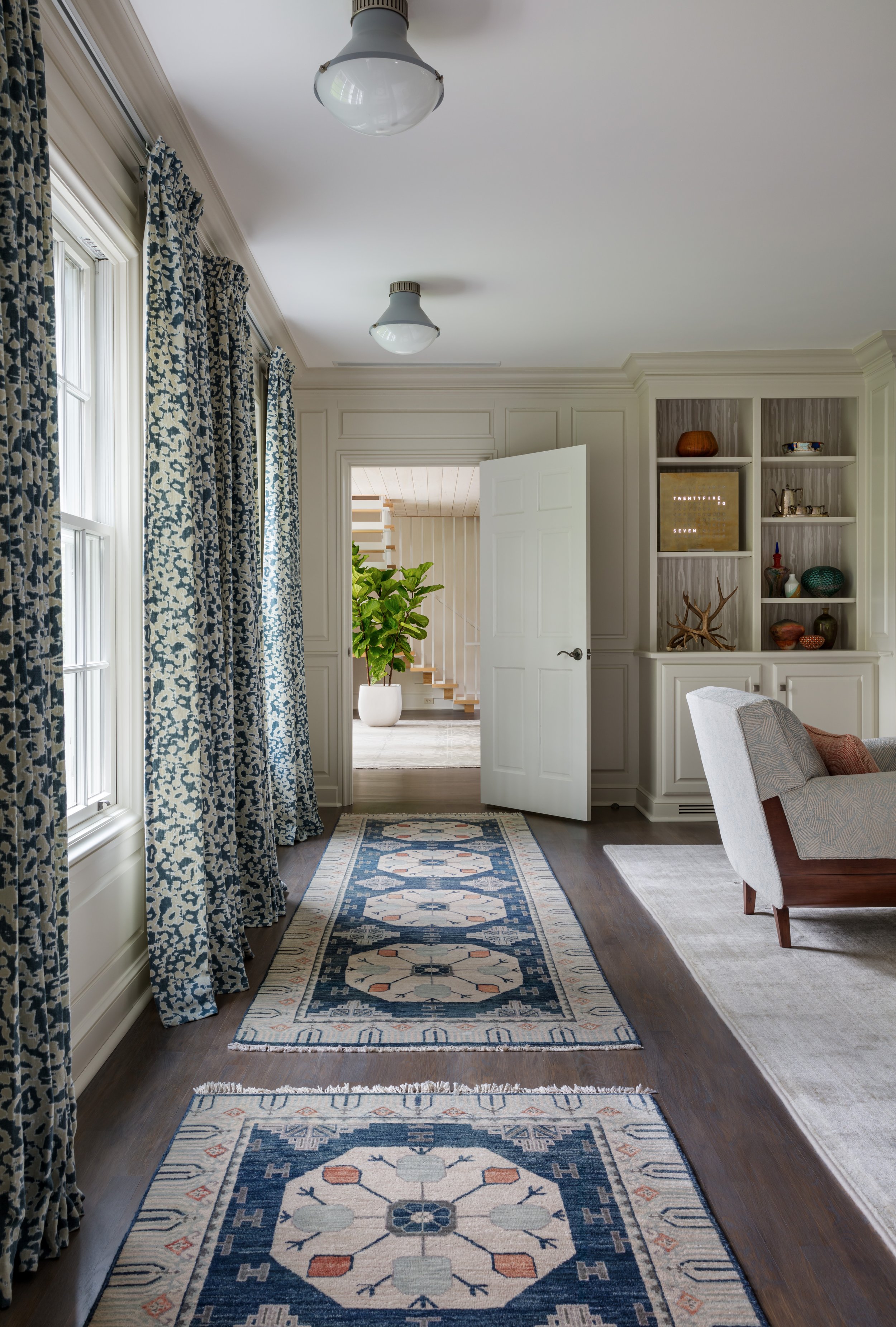 cozy-elegant-hallway-with-blue-and-white-patterned-runners.jpg