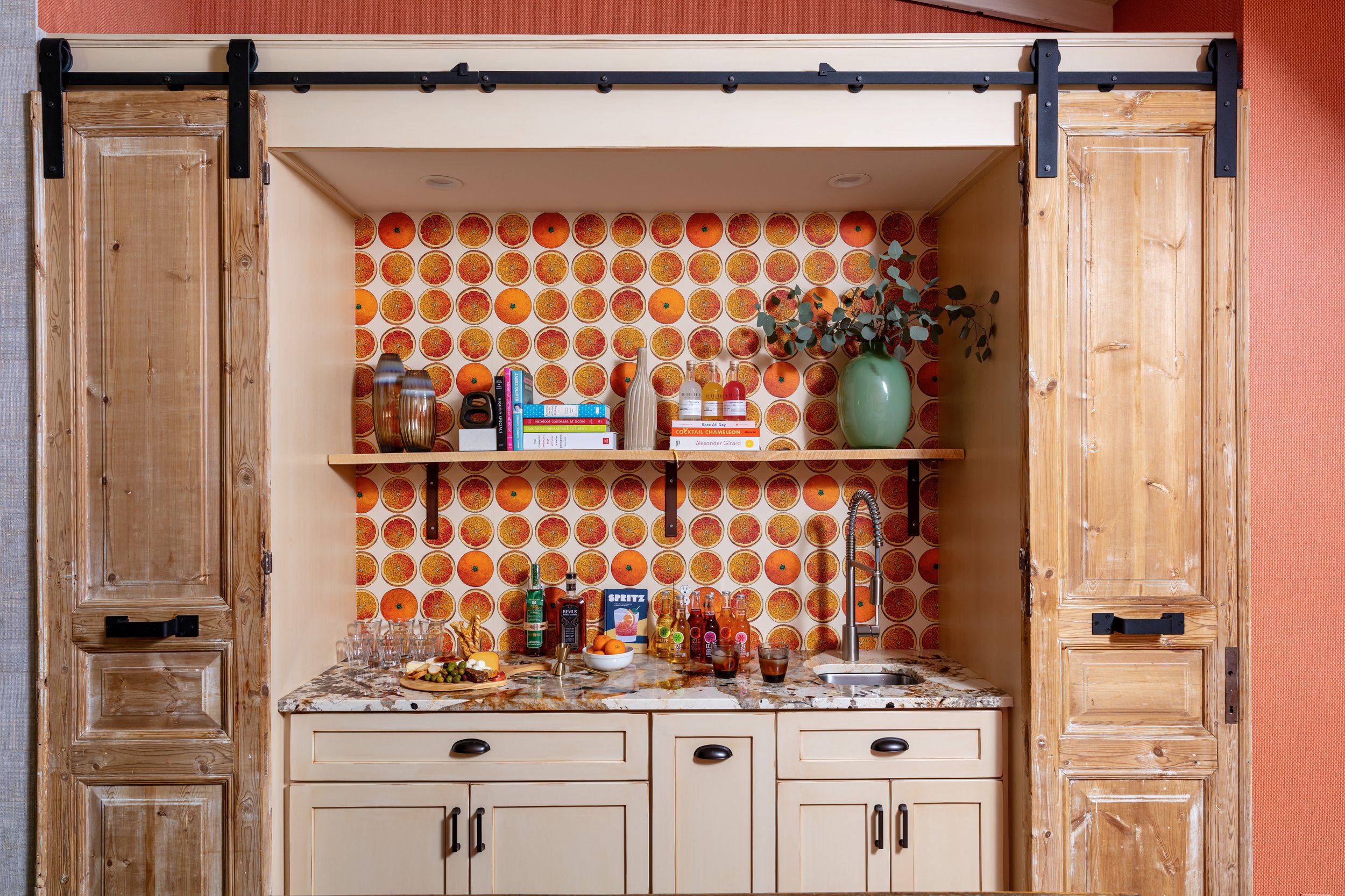 functional-kitchen-bar-inspiration-with-quartz-counter-open-shelving-statement-orange-wallpaper.jpg