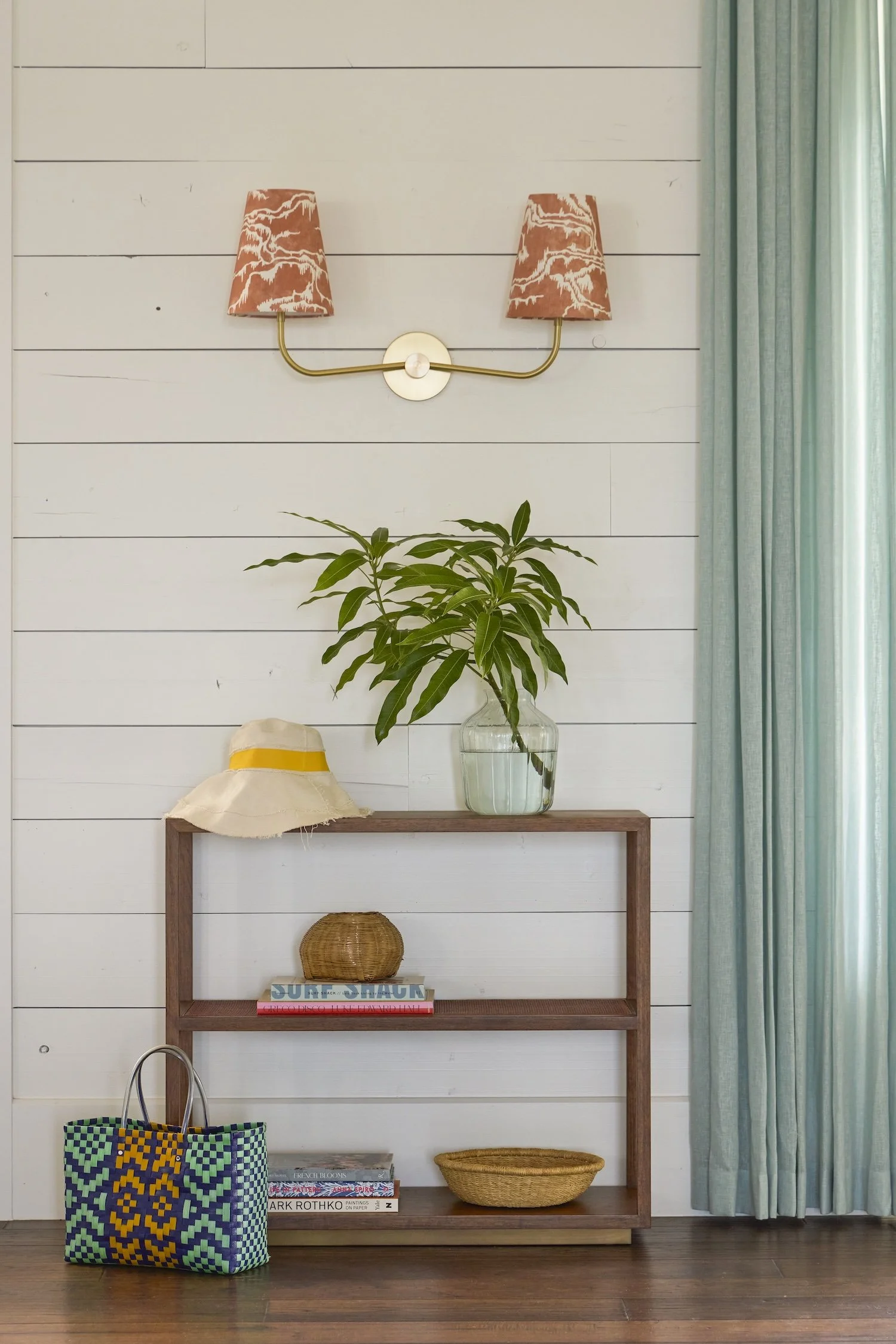 9-coastal-entryway-shiplap-wall-console-table-straw-hat-woven-bag-sconces-tropical-home-decor-design.jpg