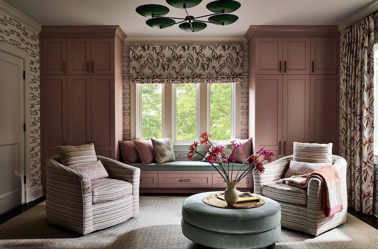 bedroom sitting area dark rose built ins window seat botanical roman shade striped swivel chairs g