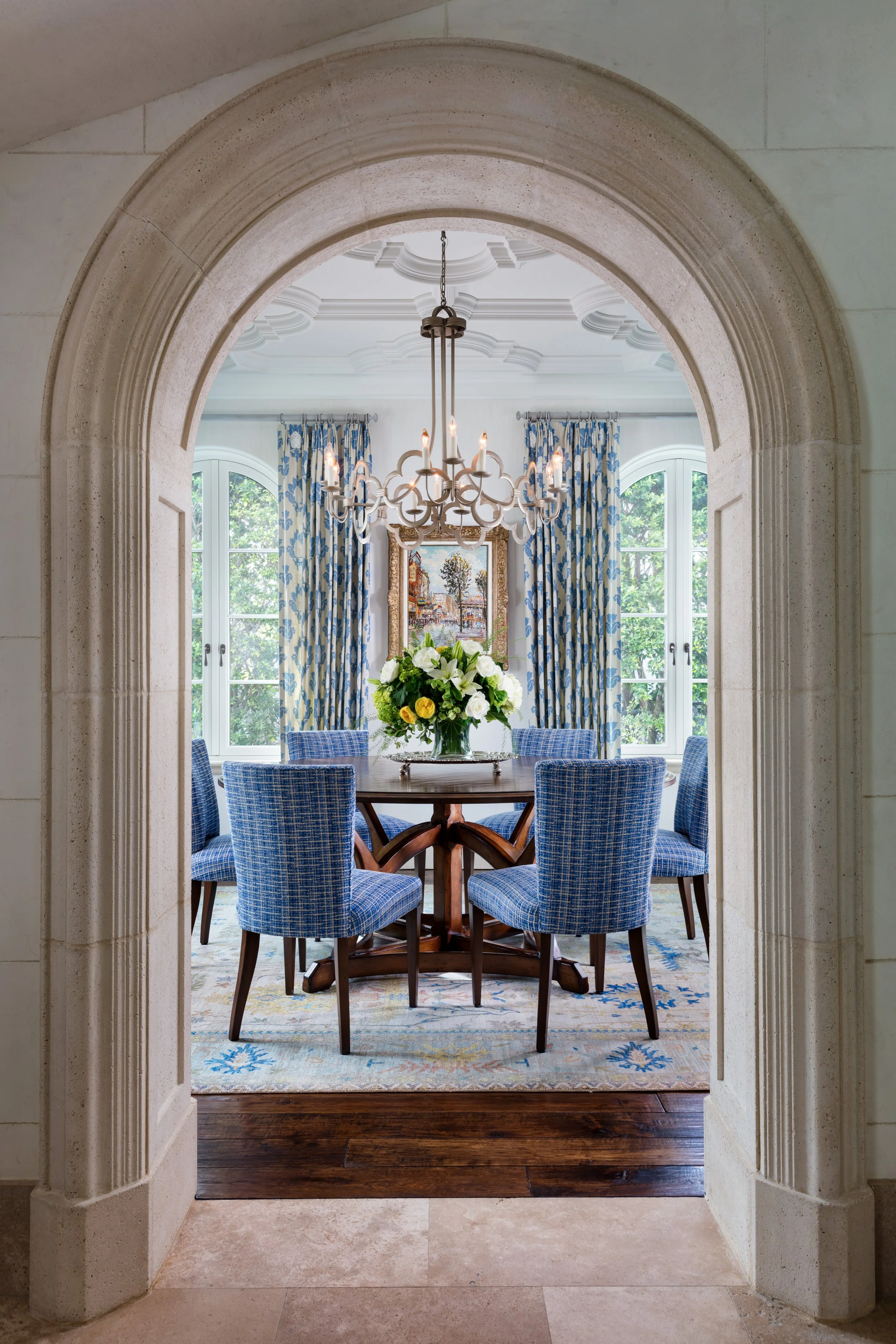 elegant-dining-room-with-stately-chandelier-and-large-window-views.jpg
