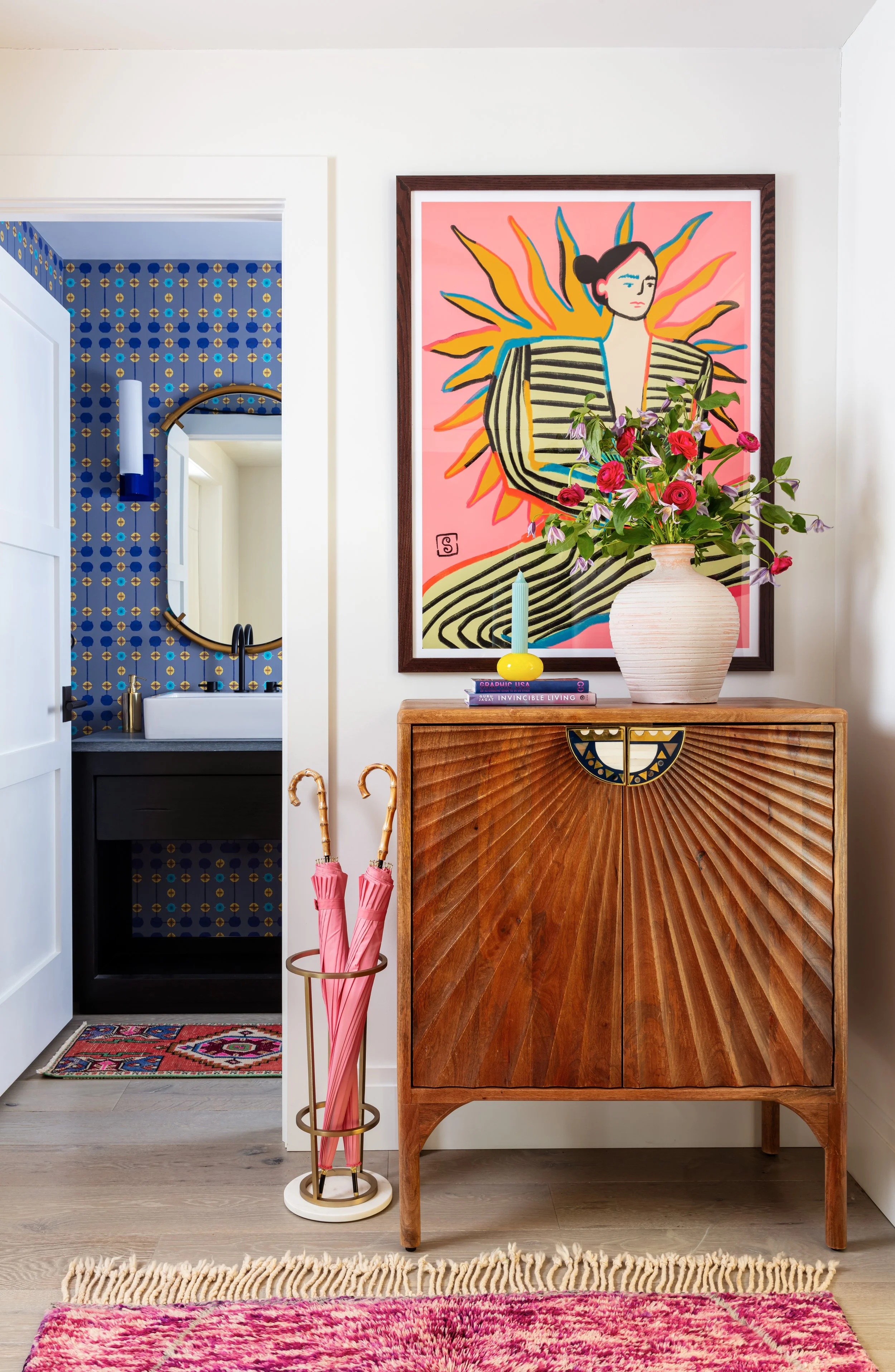 fun-entryway-with-console-table-and-statement-art-piece.jpg