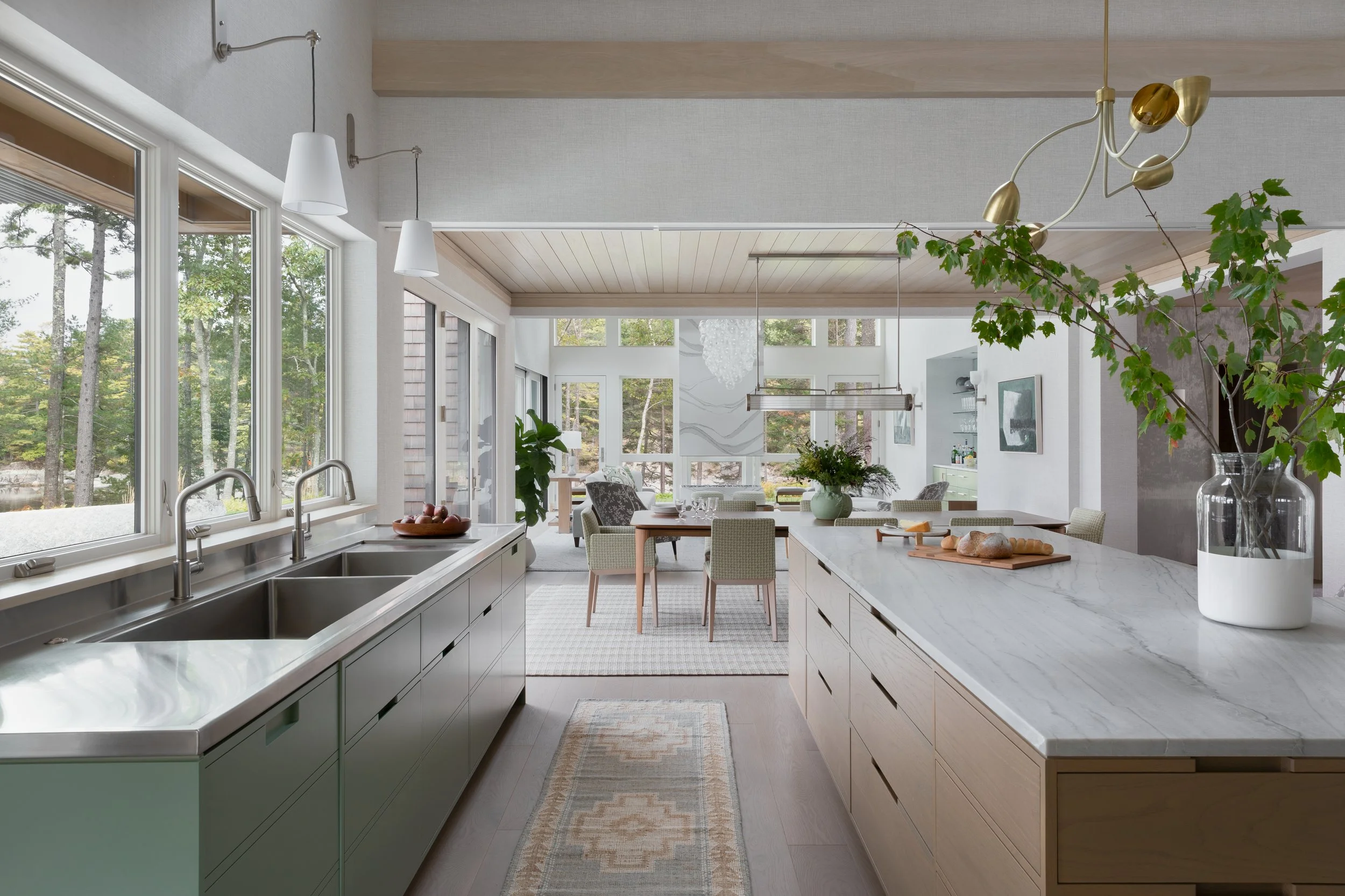 open-concept-design-flow-living-dining-kitchen-neutral-tones-natural-light-airy-vibes.jpg