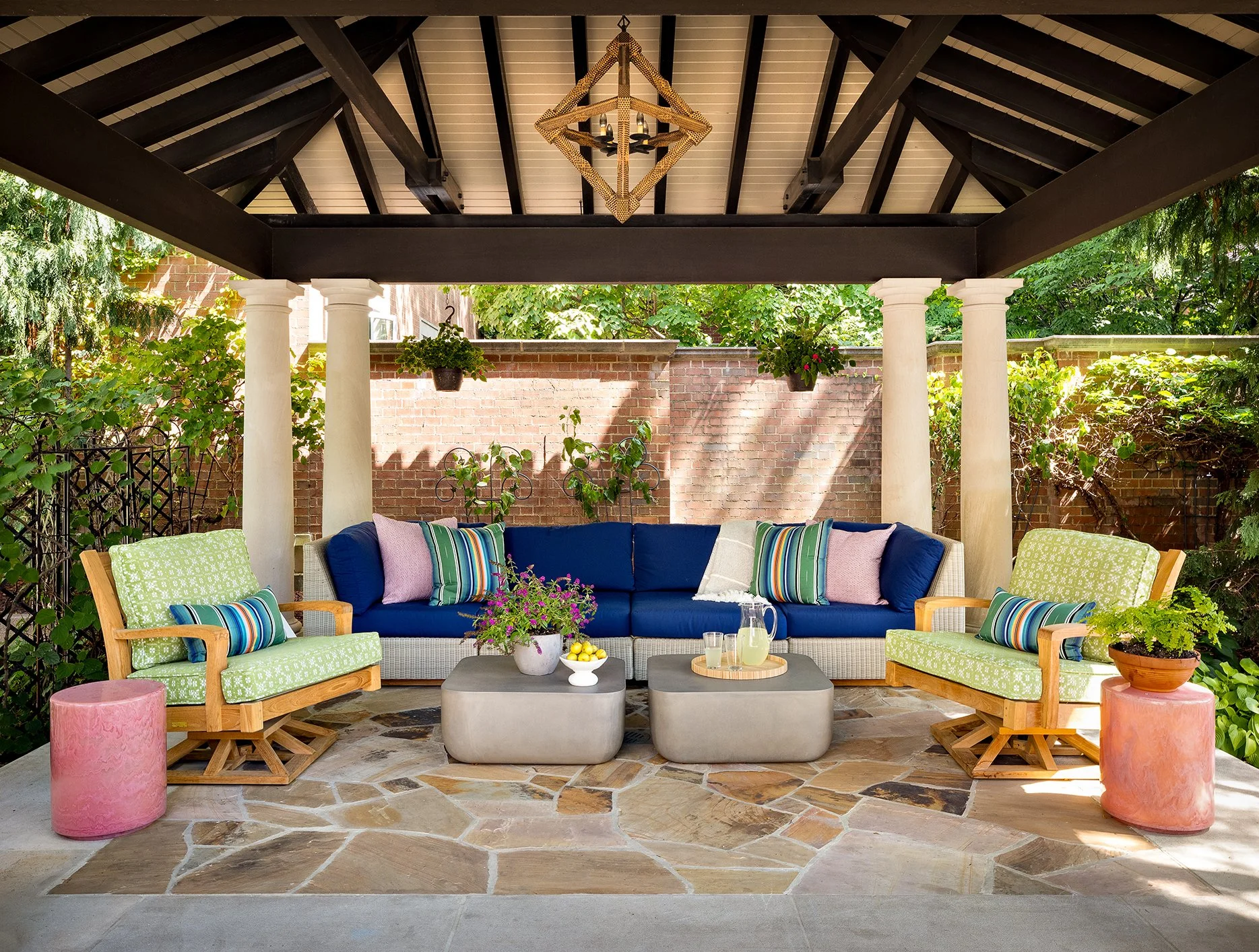 bright fun colorful outdoor conversation area blue sofa green swivel chairs