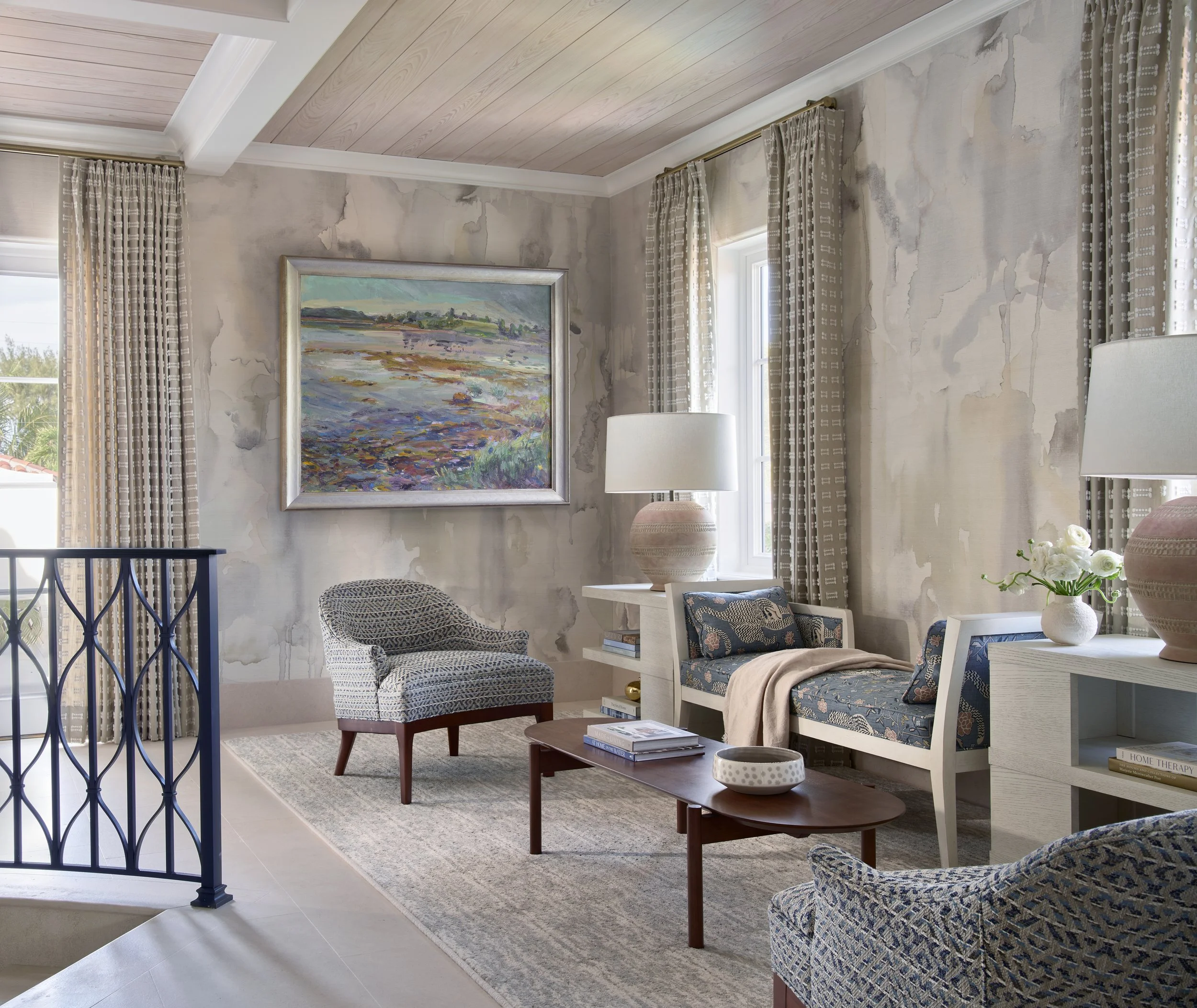 living room with artistic wall painting patterned chairs beige curtains modern home decor elegant furniture comfortable seating space