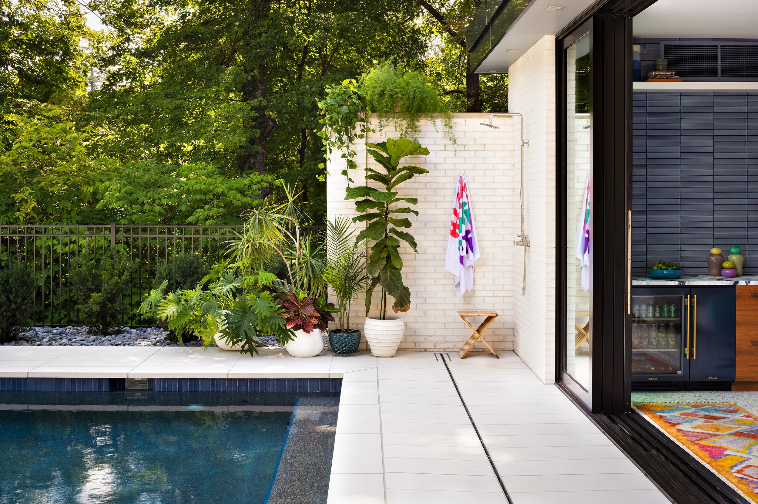 serene pool with outdoor shower oasis feel