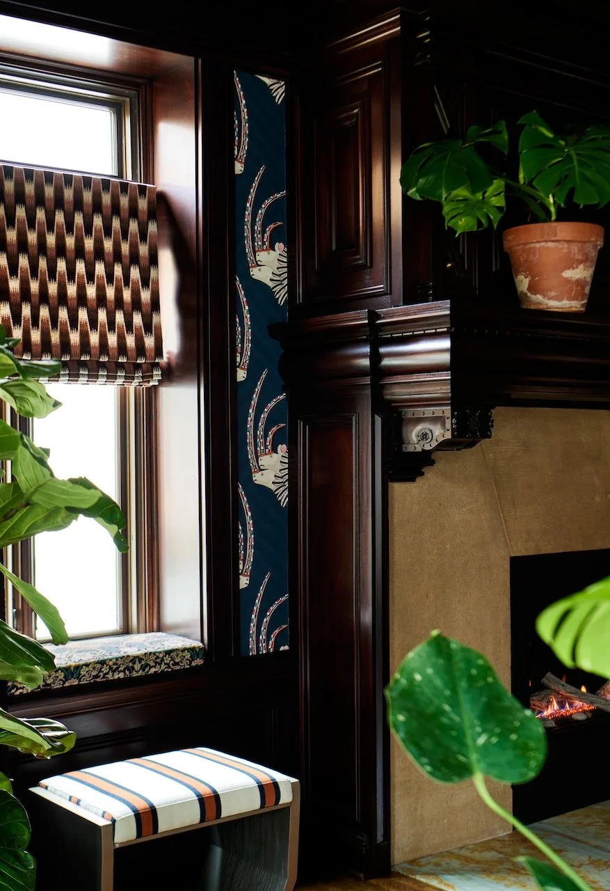 Traditional dining room patterned roman shades curved mantel woodwork