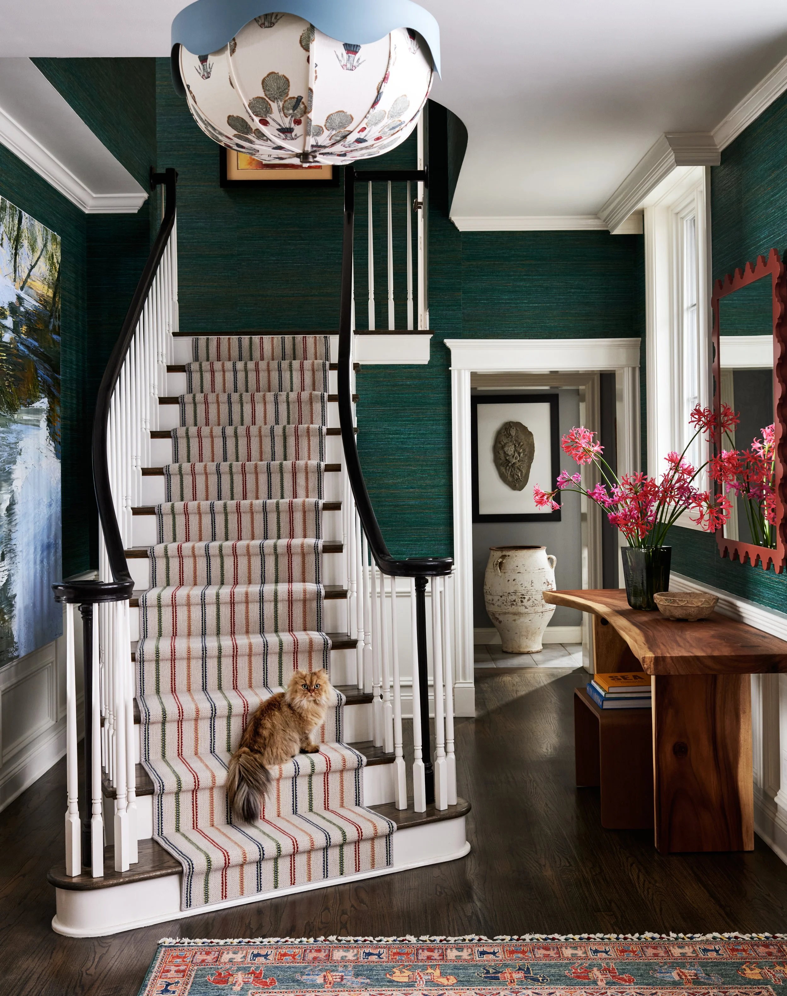 Striped stair runner with bold and warm color tones. 