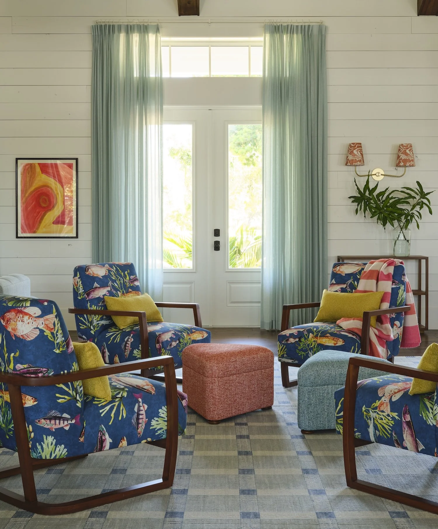 6-florida-home-living-room-fish-pattern-chairs-ottomans-sheer-curtains-coastal-vibrant-decor-unique-style.jpg