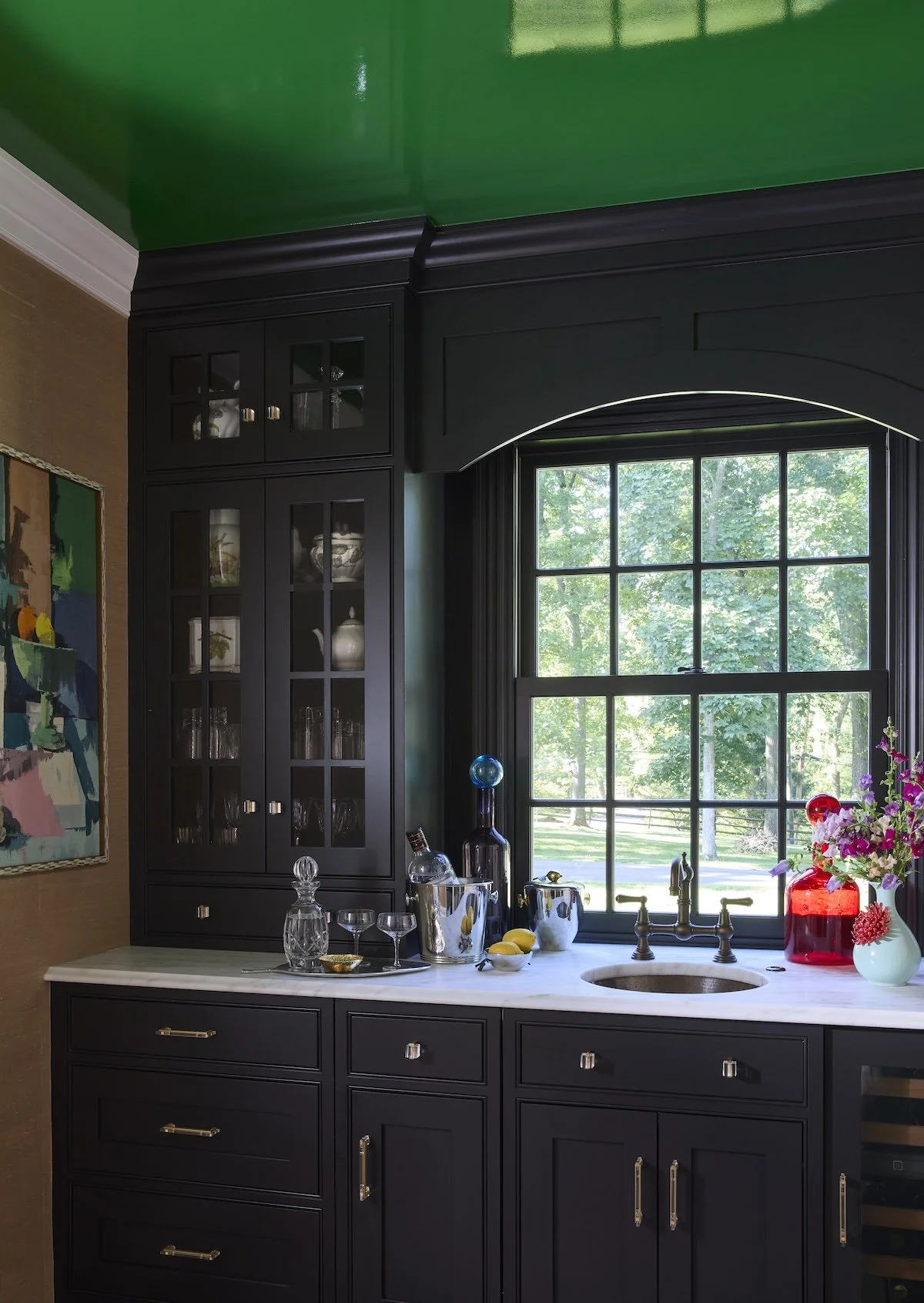 13 luxury bar pantry with glossy green lacquered ceiling matte black cabinets white marble counter brass faucet and vibrant styling by betsy wentz