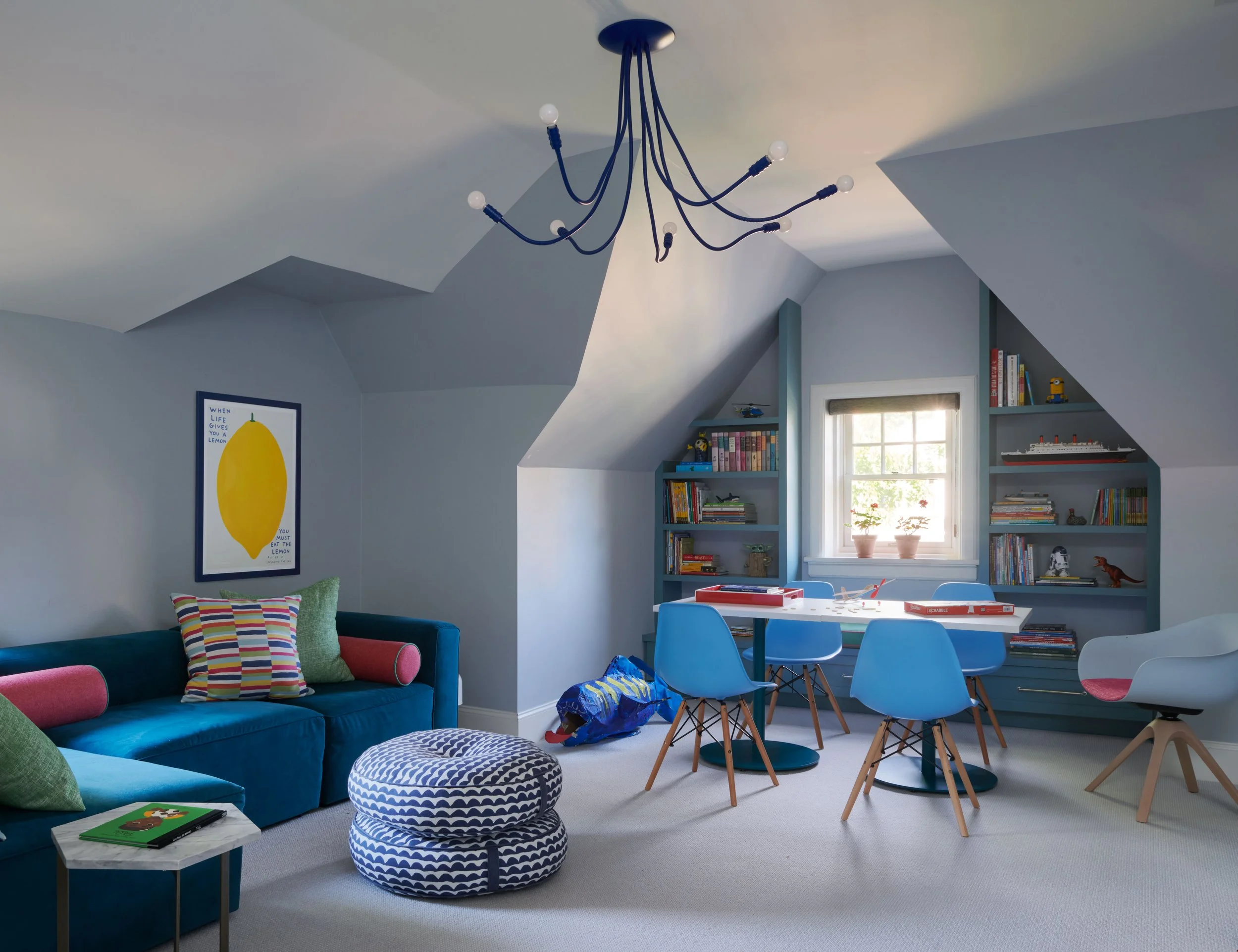 fun-playroom-kids-games-comfortable-seating-kid-friendly-decor.jpg