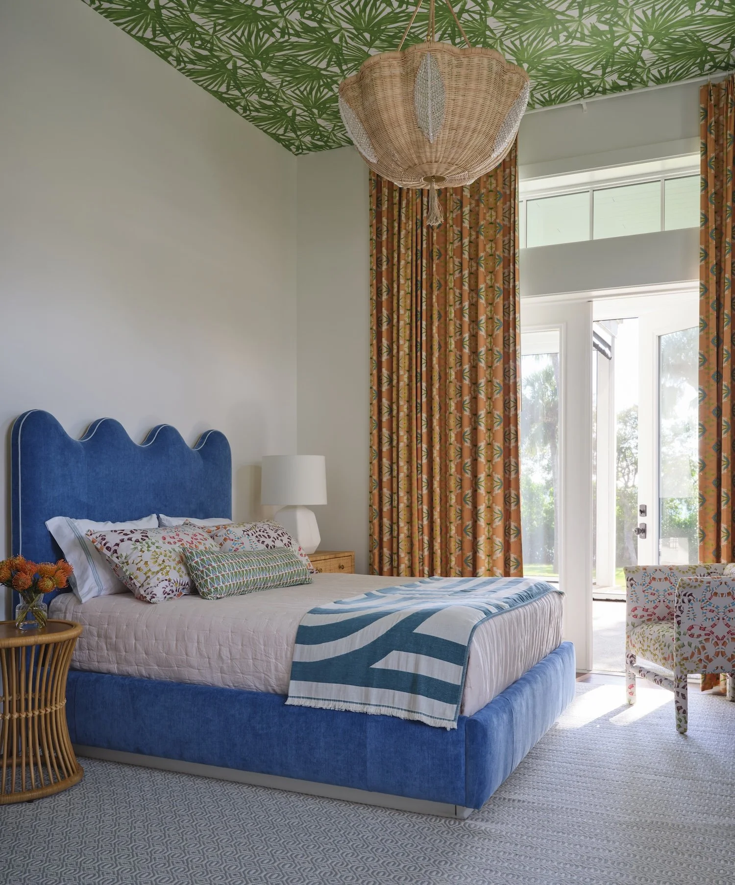 35-tropical-bedroom-blue-wavy-bed-palm-leaf-ceiling-patterned-curtains-wicker-light-vibrant-retreat.jpg