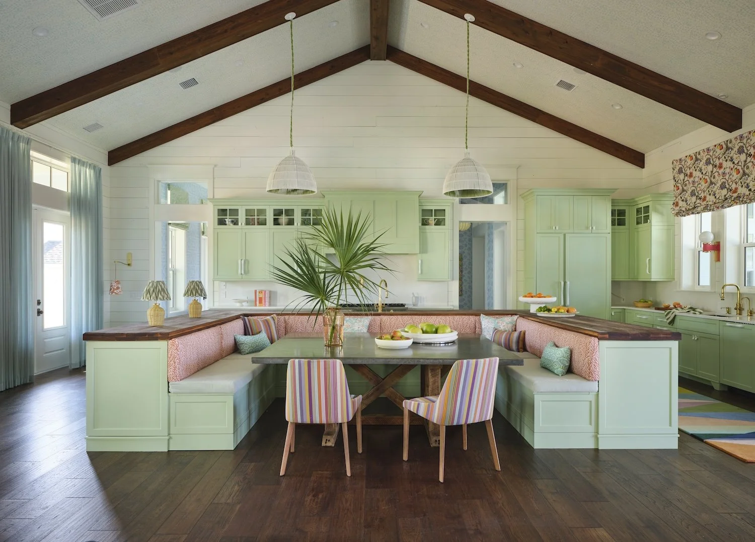 14-florida-kitchen-mint-green-cabinets-wood-beams-vaulted-ceiling-built-in-banquette-colorful-accents.jpg