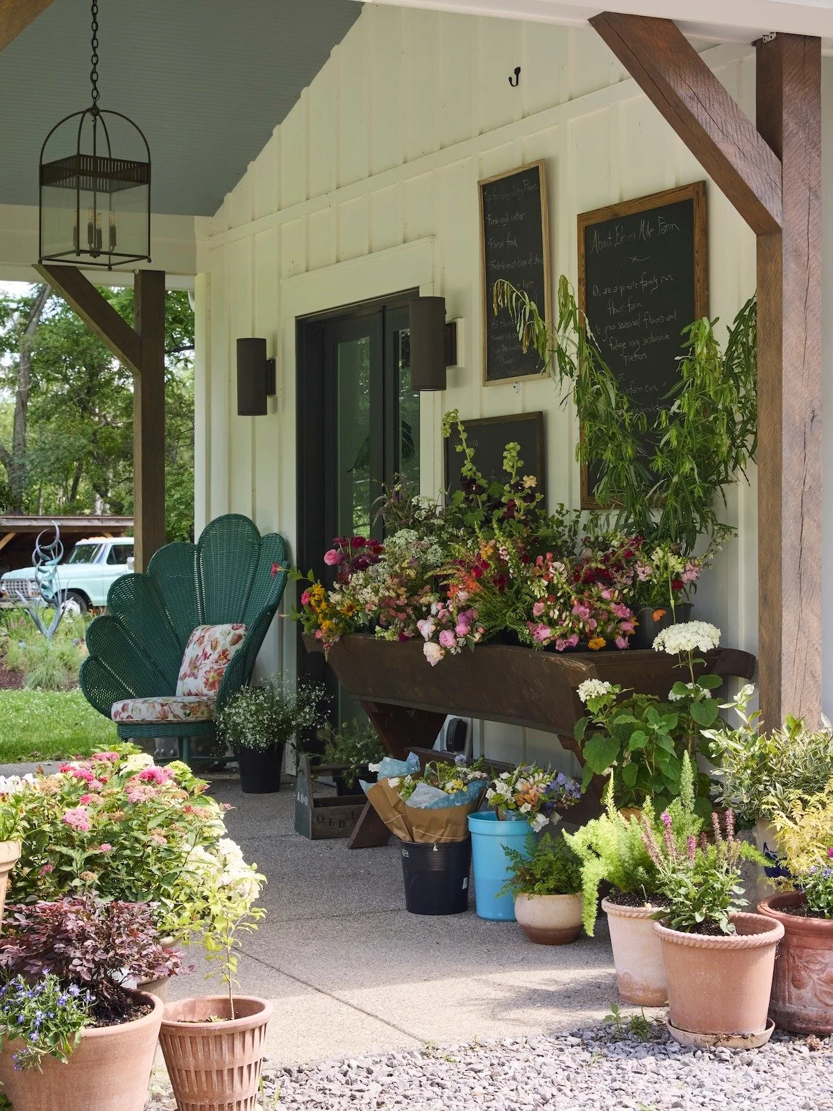 pittsburgh-fox-chapel-barn-mile-farm-flower-stand-fresh-cut-bouquets-green-wicker-peacock-chair.jpg