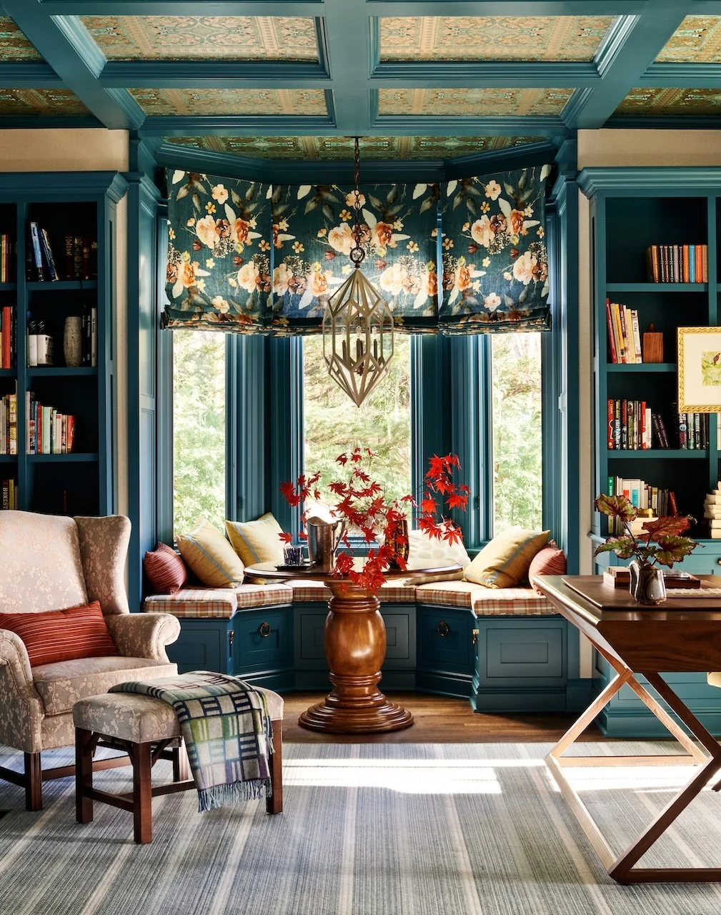 dramatic home office builtin window seat bookcases